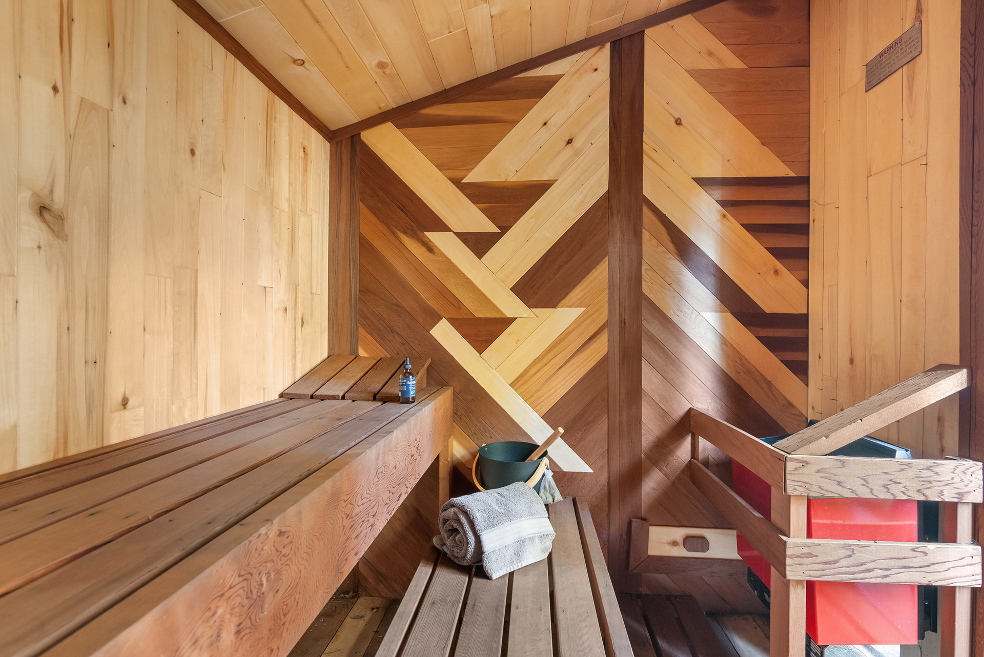 Interior photography of custom wood sauna room amenity in luxury vacation rental listing - Andrew Crippen Visuals