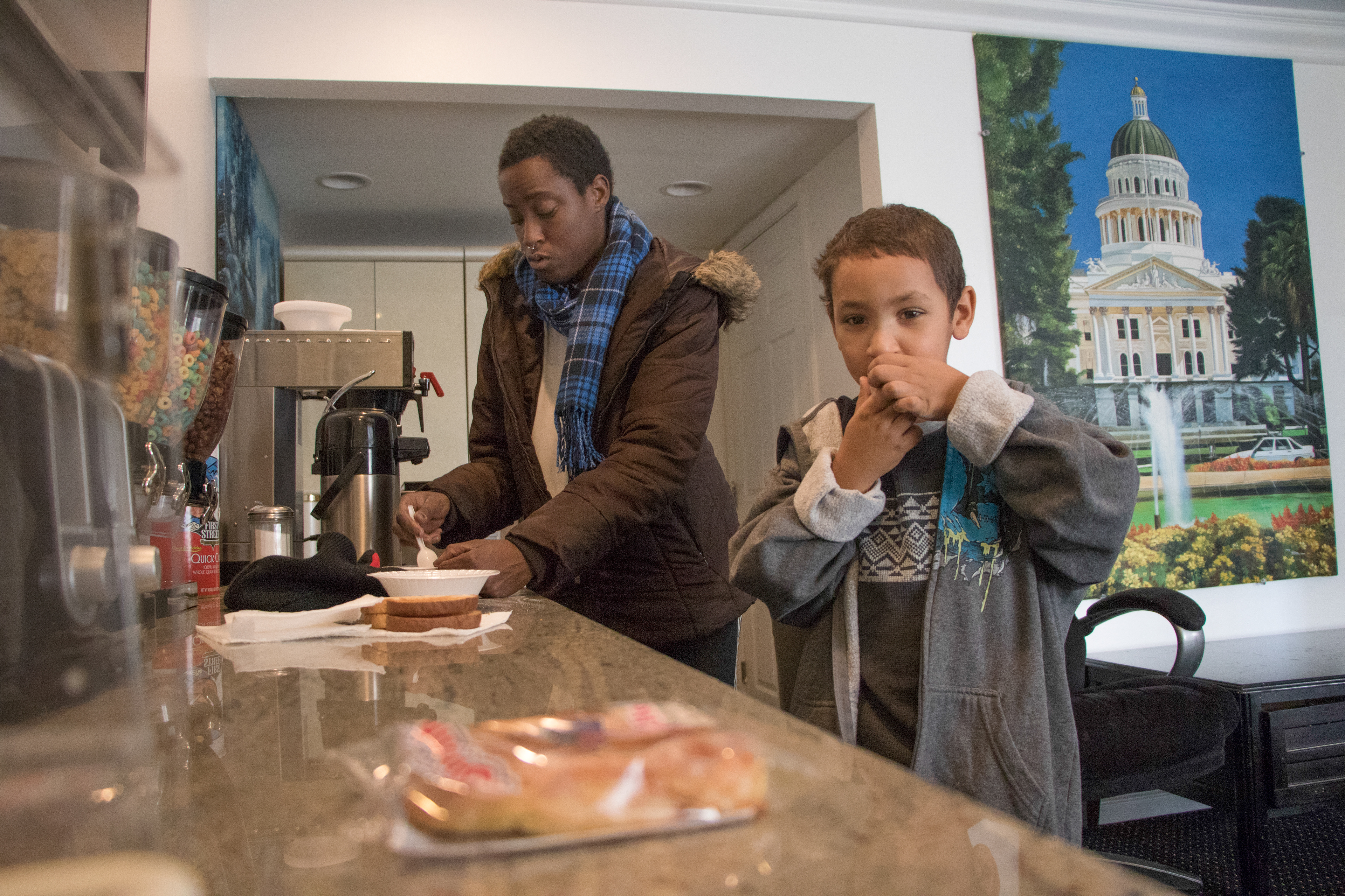 Duren-Hill and Gavin head down to have breakfast provided by their motel Americas Best Value Inn in Sacramento, Calif. on Jan. 3, 2019.