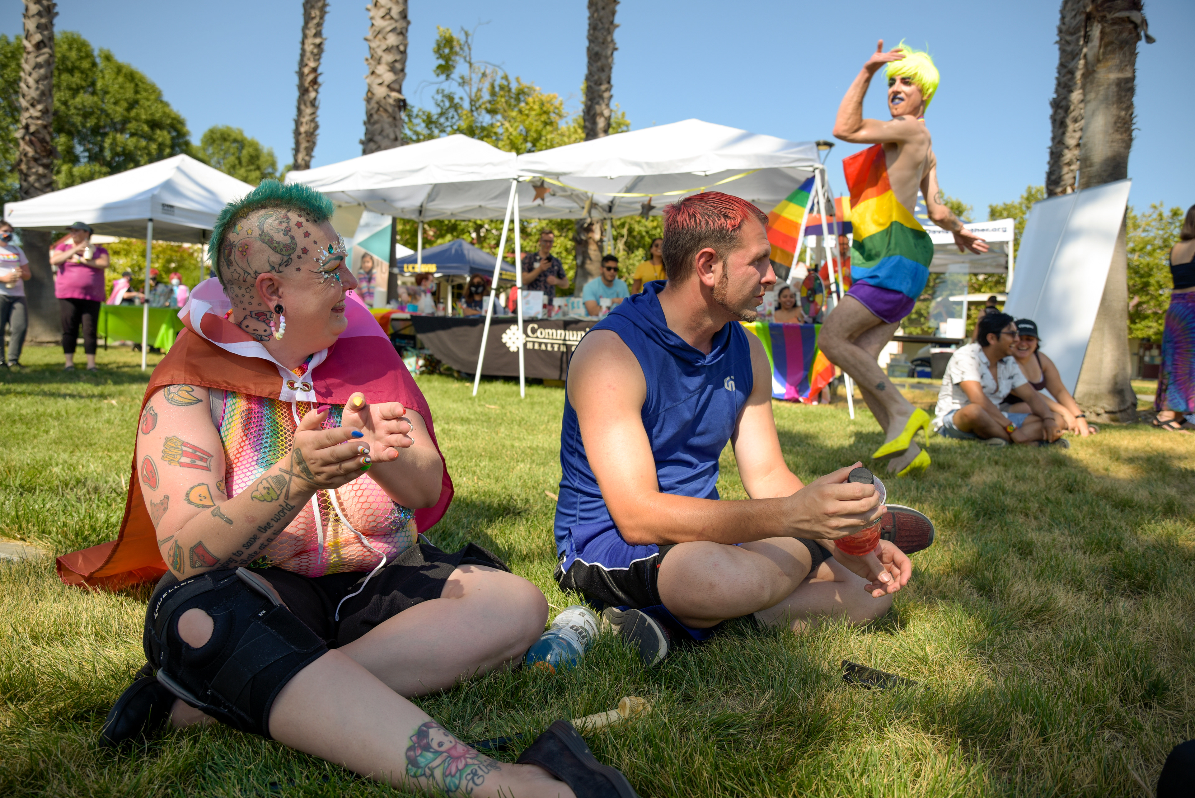  Samantha Bourgeois (left) and Joe DeSoul attend a pride event in Woodland, Calif. on June 6, 2021. 