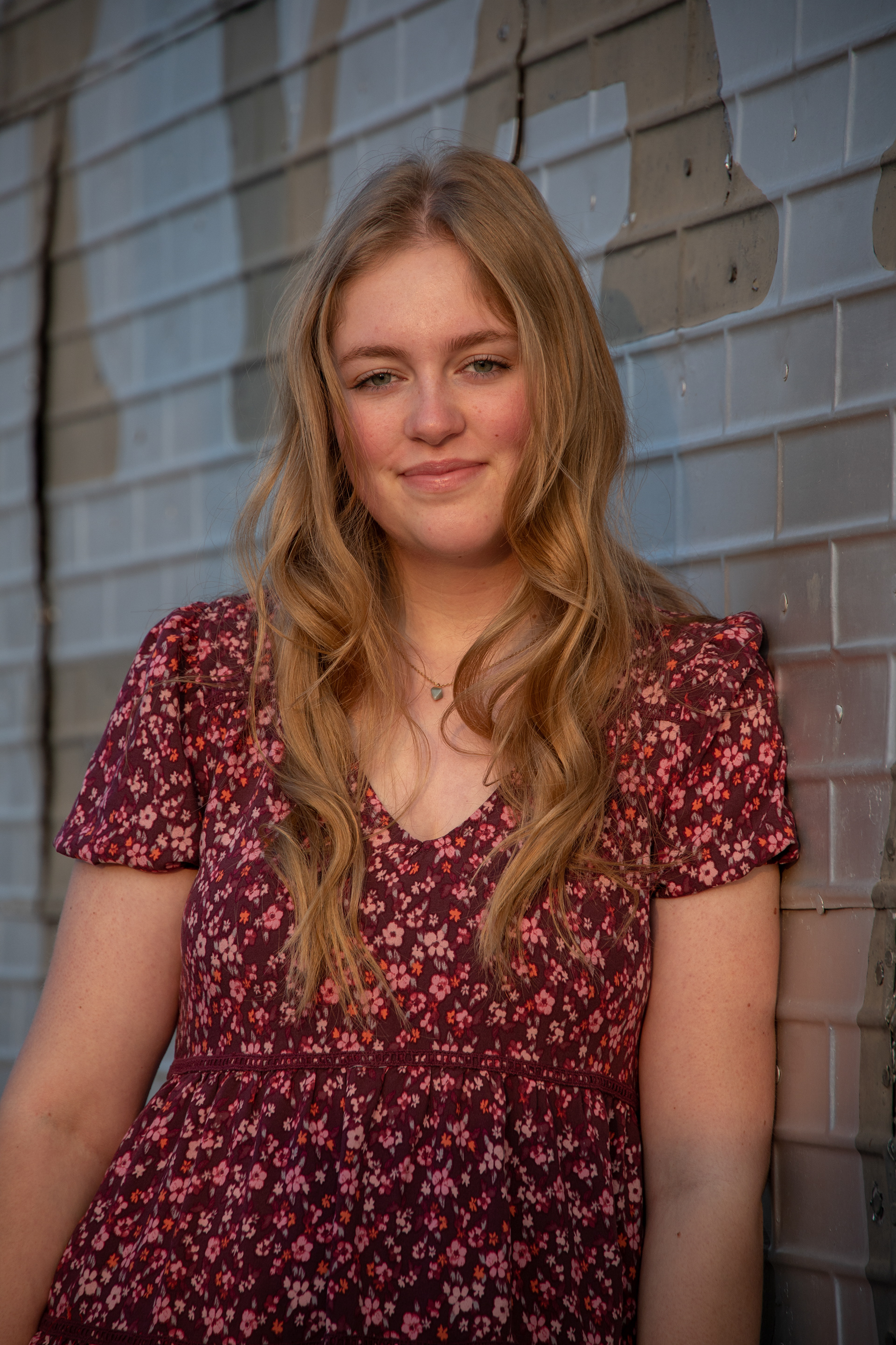 High school senior portrait taken during golden hour