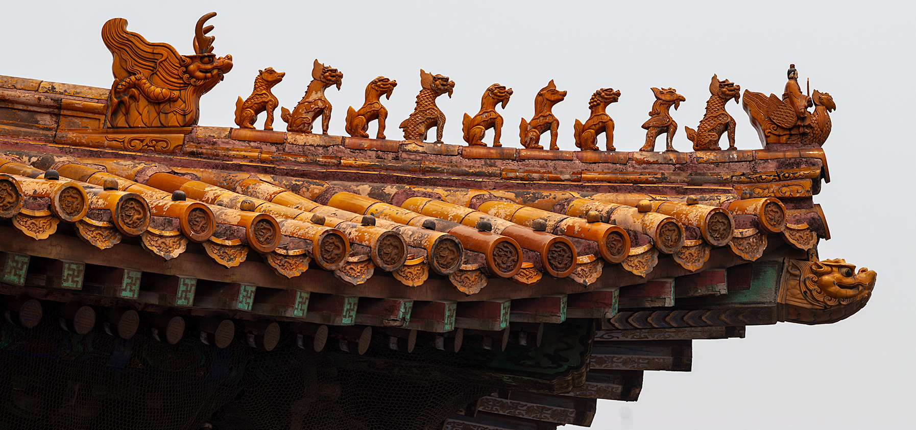 Roof figurines on a building in the Forbidden City, Beijing