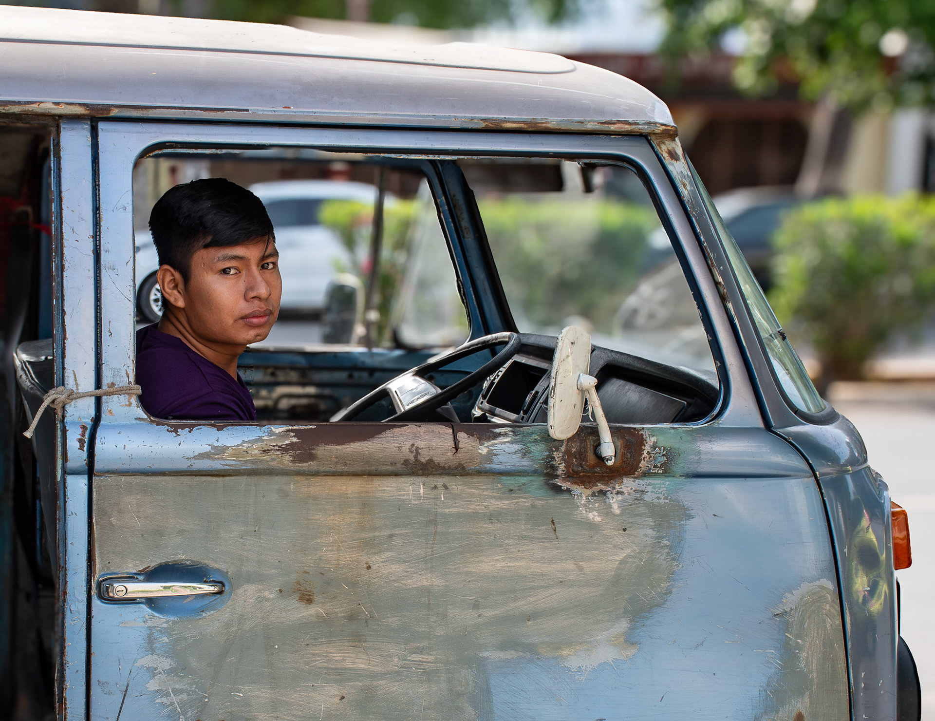 Young man, old car • Mexico