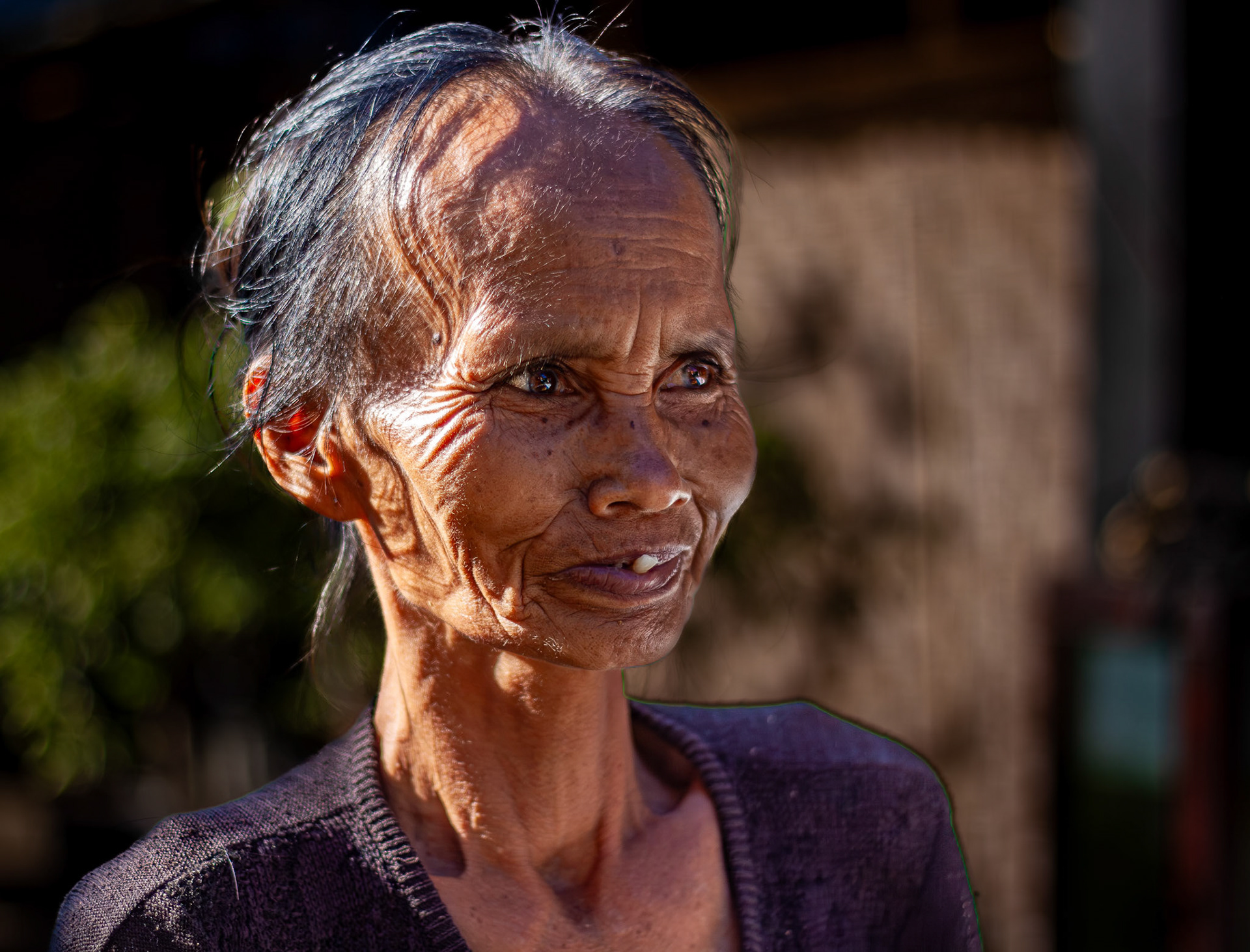 Woman with one tooth • Indonesia
