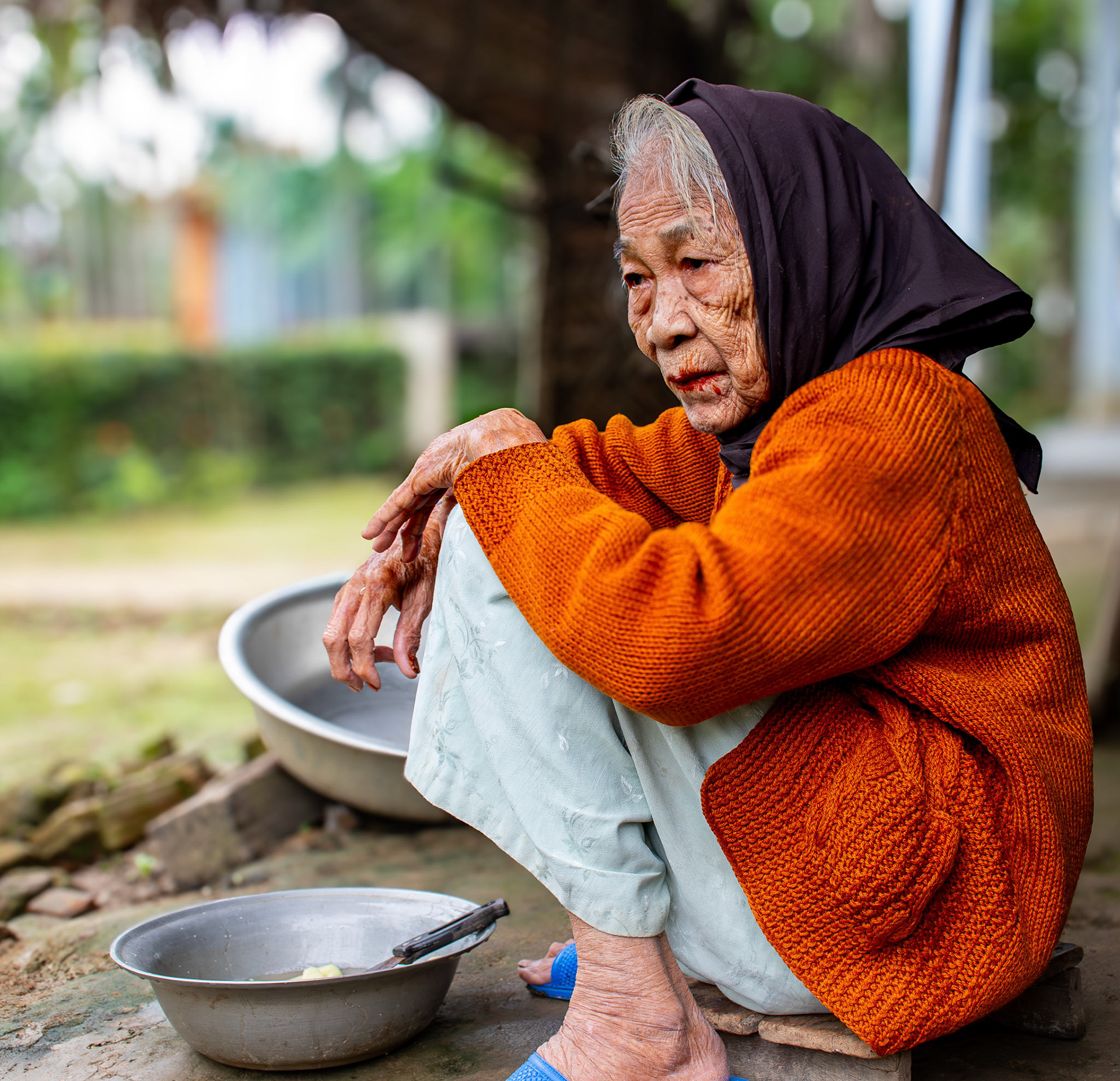 Woman with sorrowful gaze • Vietnam