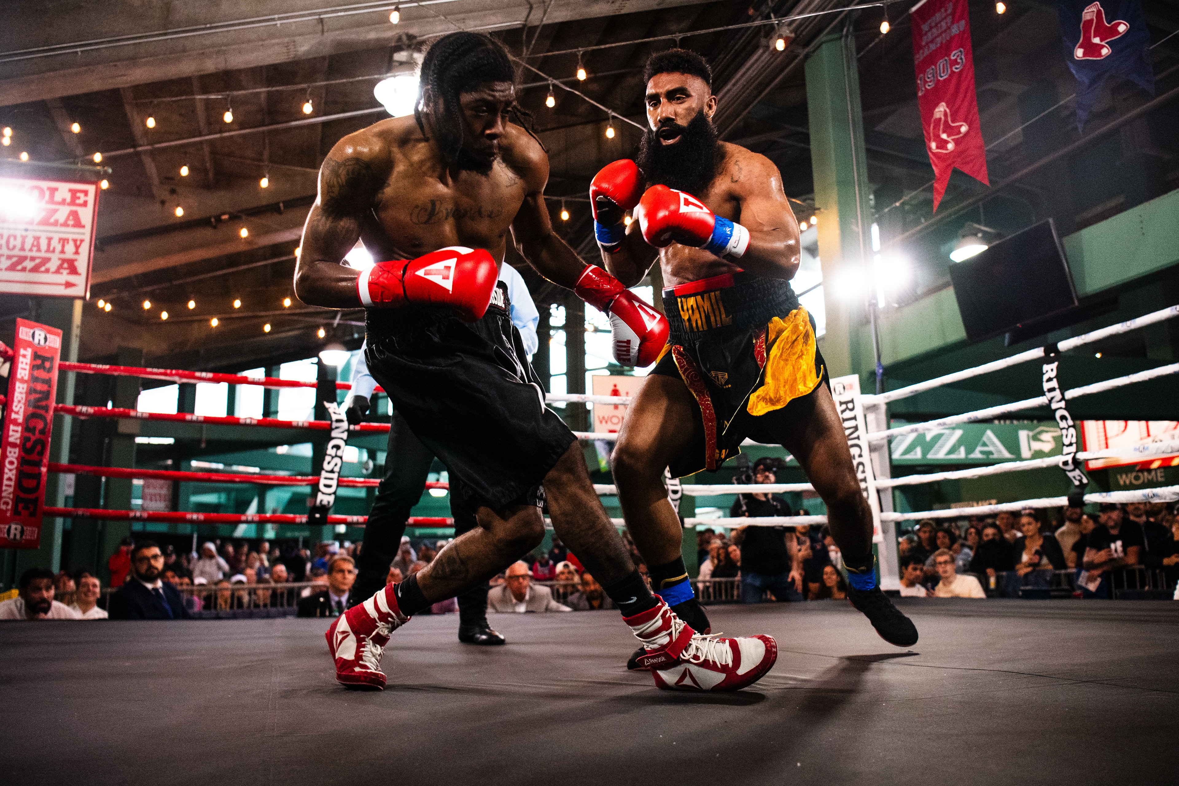 June 7, 2025, Boston, MA: Sheniell Rodriguez, right, of Bolton, Mass., knocks down Rakim Johnson, left, of Indianapolis, Ind., during their bout at Fenway Park on Saturday, June 7, 2025. (Photo by Clay Stark/Boston Red Sox)