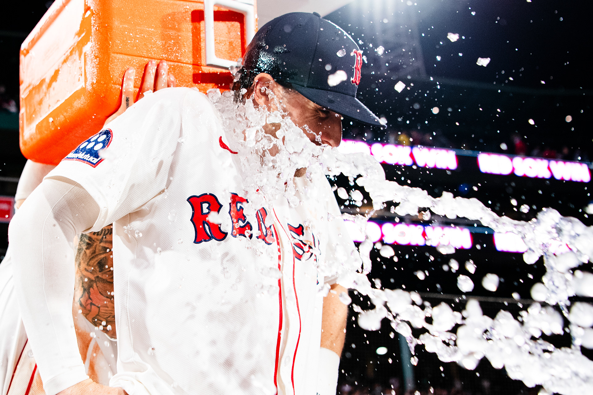 September 17, 2025, Boston, MA: Nick Sogard #20 of the Boston Red Sox gets splashed with water by Jarren Duran #16 of the Boston Red Sox after hitting a walk off single during the tenth inning against the Athletics at Fenway Park in Boston, Massachusetts Wednesday, September 17, 2025. (Photo by Clay Stark/Boston Red Sox)
