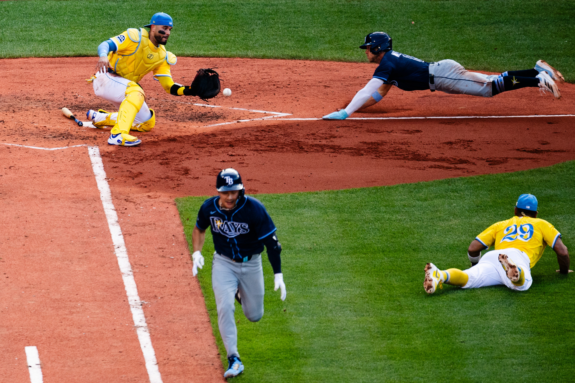 July 12, 2025, Boston, MA: Abraham Toro #29 of the Boston Red Sox throws Carlos Narvaez #75 of the Boston Red Sox the ball to tag out Taylor Walls #6 of the Tampa Bay Rays at home in the sixth inning at Fenway Park in Boston, Massachusetts Saturday, July 12, 2025.  (Photo by Clay Stark/Boston Red Sox)