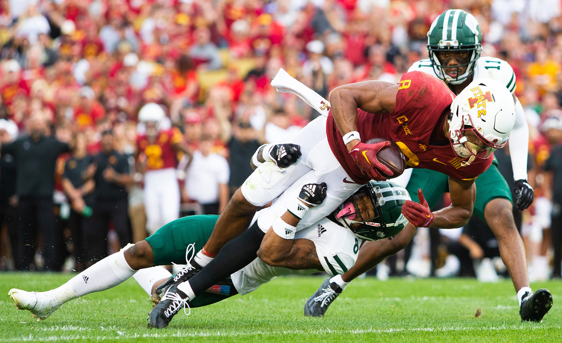 September 17, 2022, Ames, Iowa: Iowa State wide receiver Xavier Hutchinson 8 scores a touchdown while being tackled by Ohio University cornerback Justin Birchette at Jack Trice Stadium on Saturday, September 17, 2022. (Photo by Clay Stark)