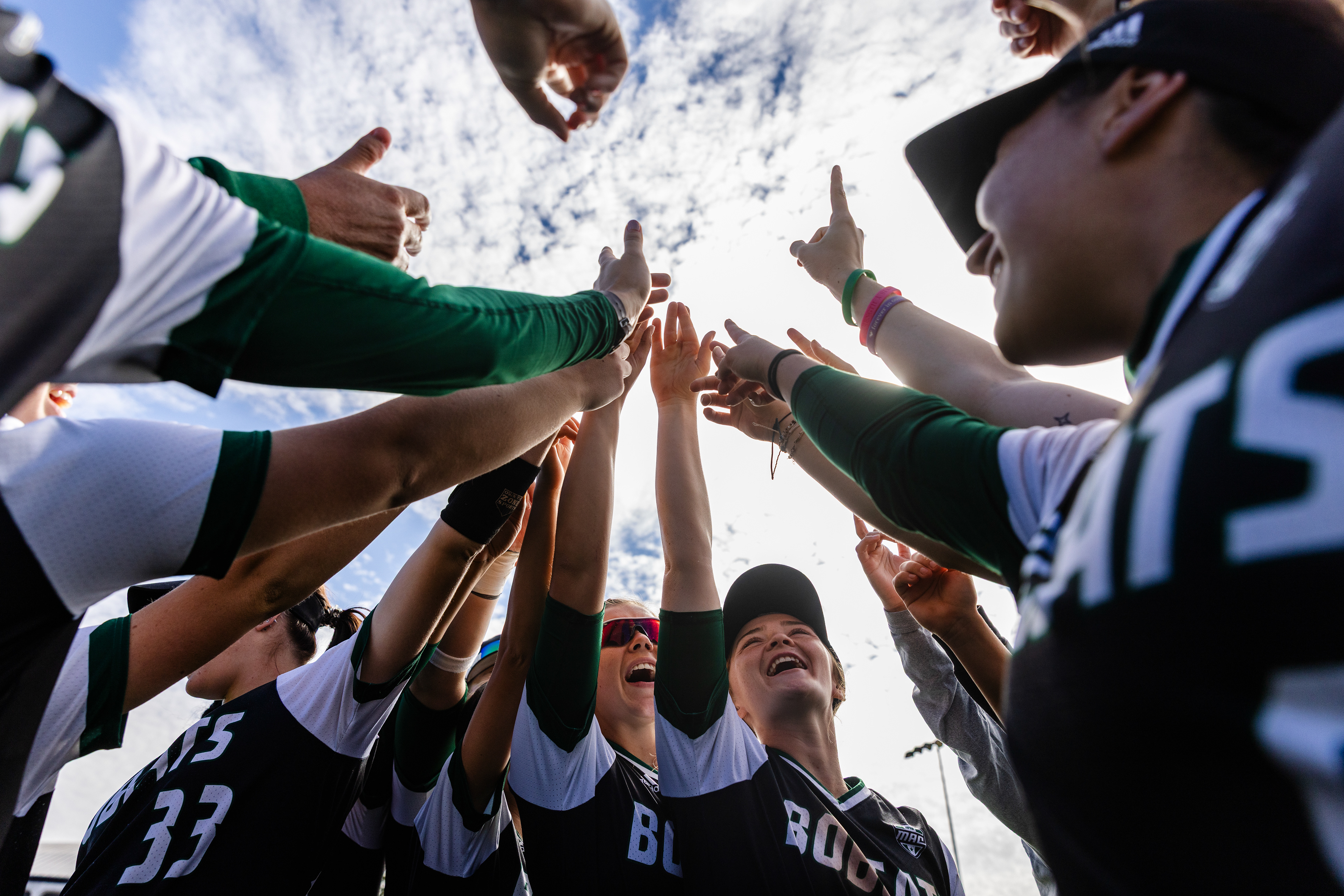 October 16, 2025, Athens, OH: Ohio University Softball team reacts in a huddle before a game against Davis and Elkins at Ohio Softball Field in Athens, Ohio Sunday, October 16, 2022. (Photo by Clay Stark) 