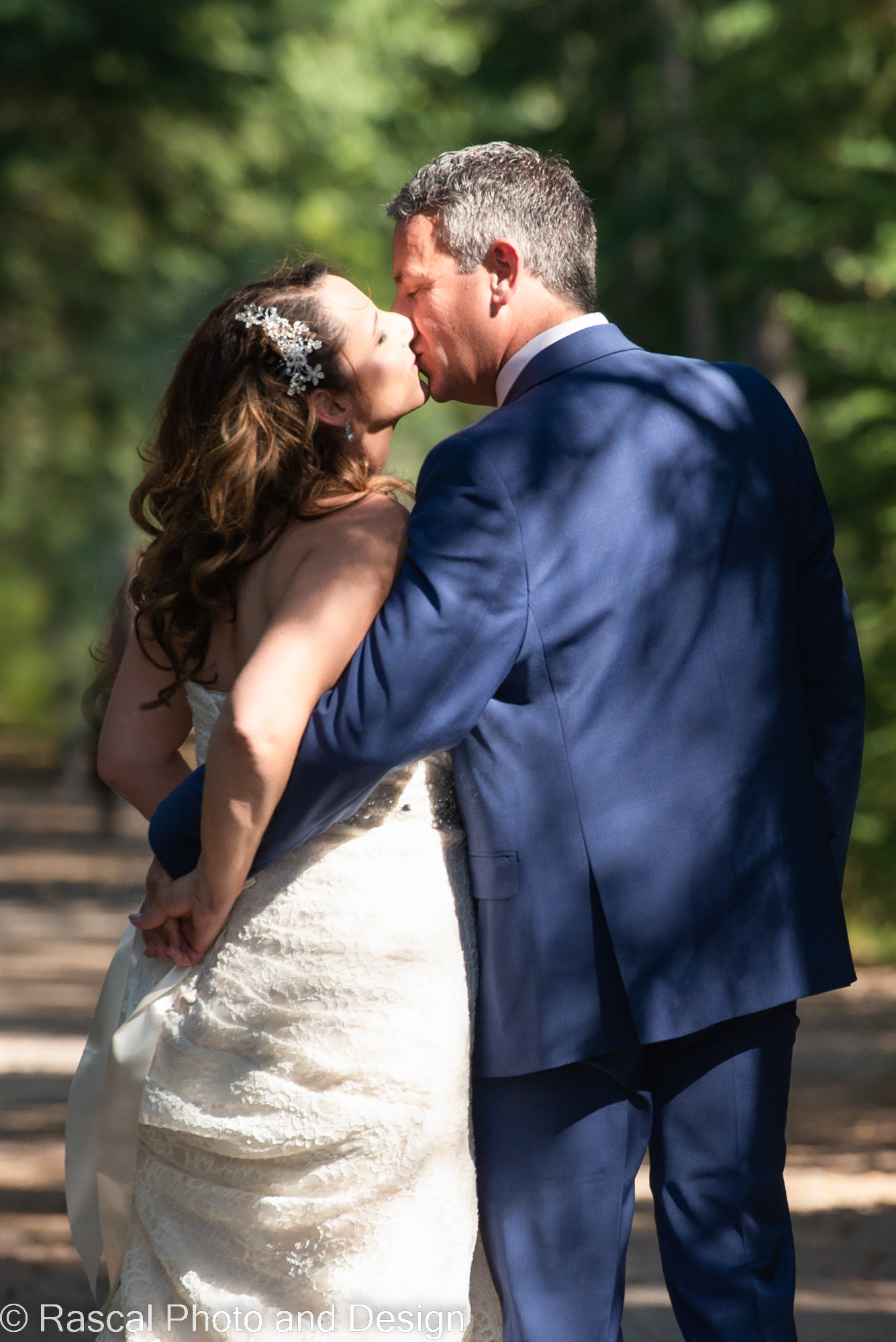 Bride and groom kissing in Canmore Alberta