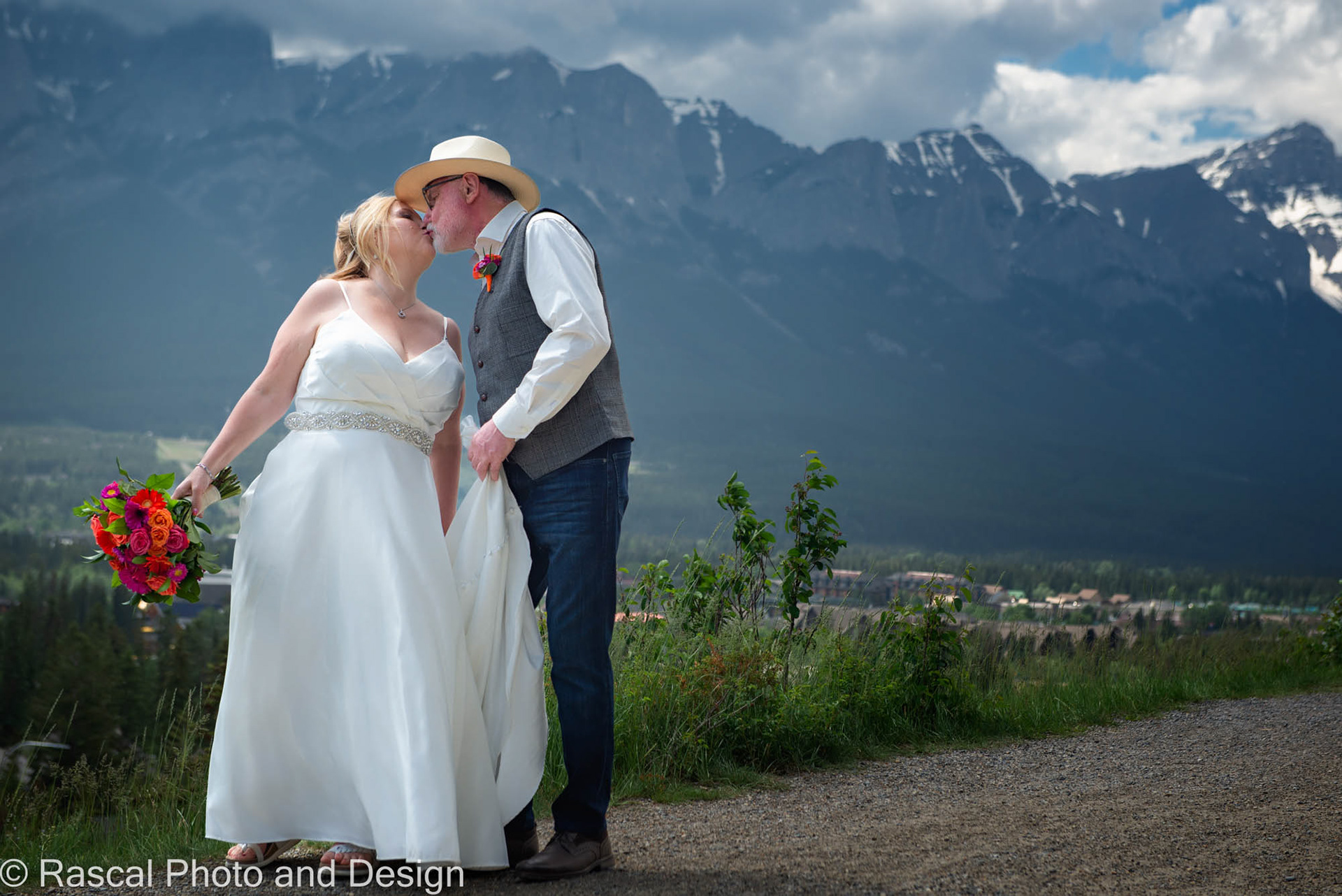 Bride and groom kissing in Canmore Alberta