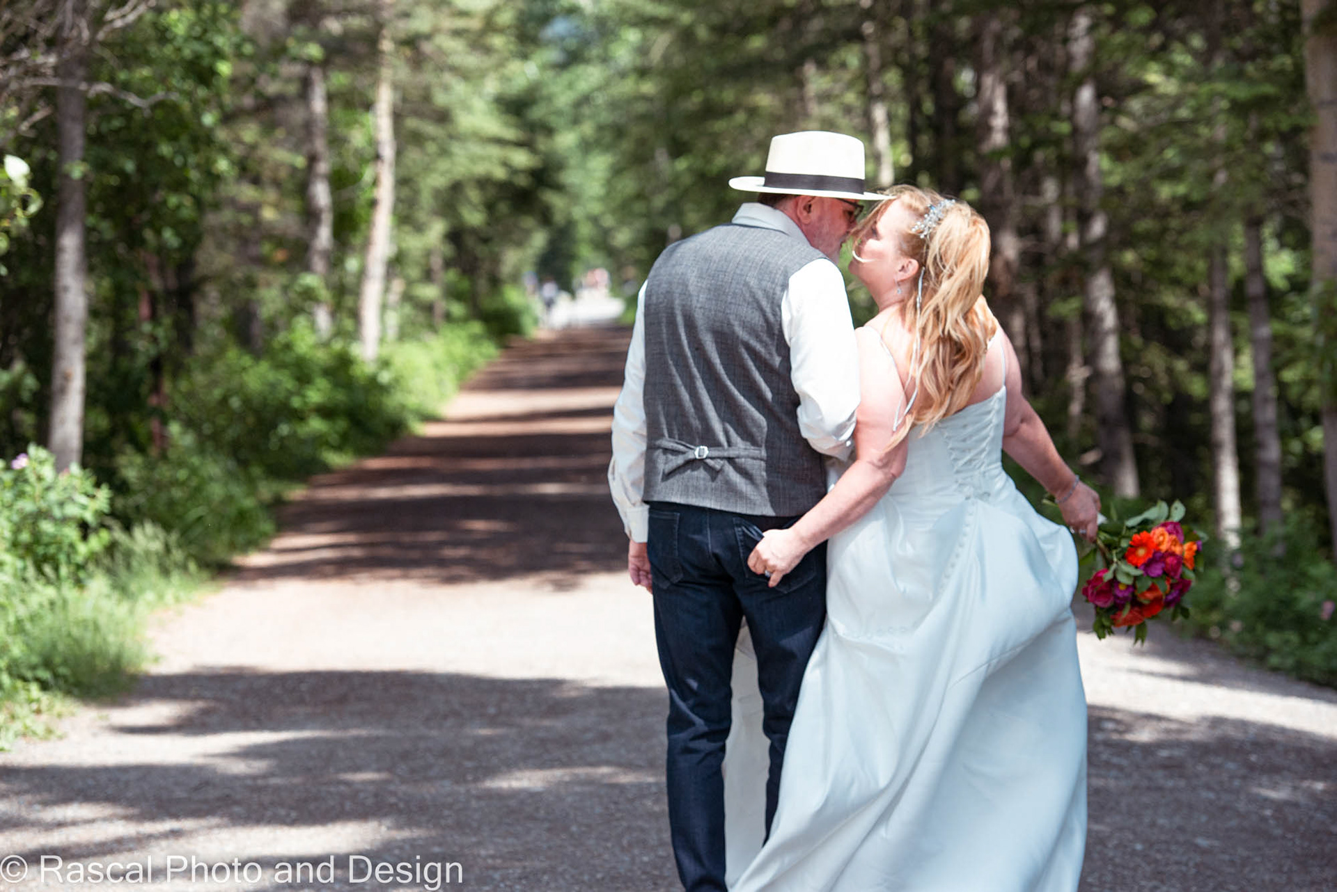 Bride and groom kissing in Canmore Alberta
