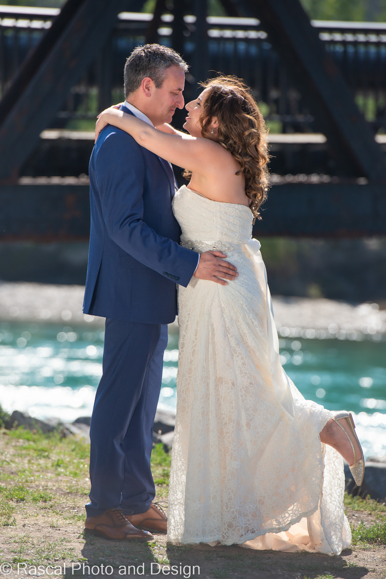 Bride and groom at Engine Bridge in Canmore Alberta