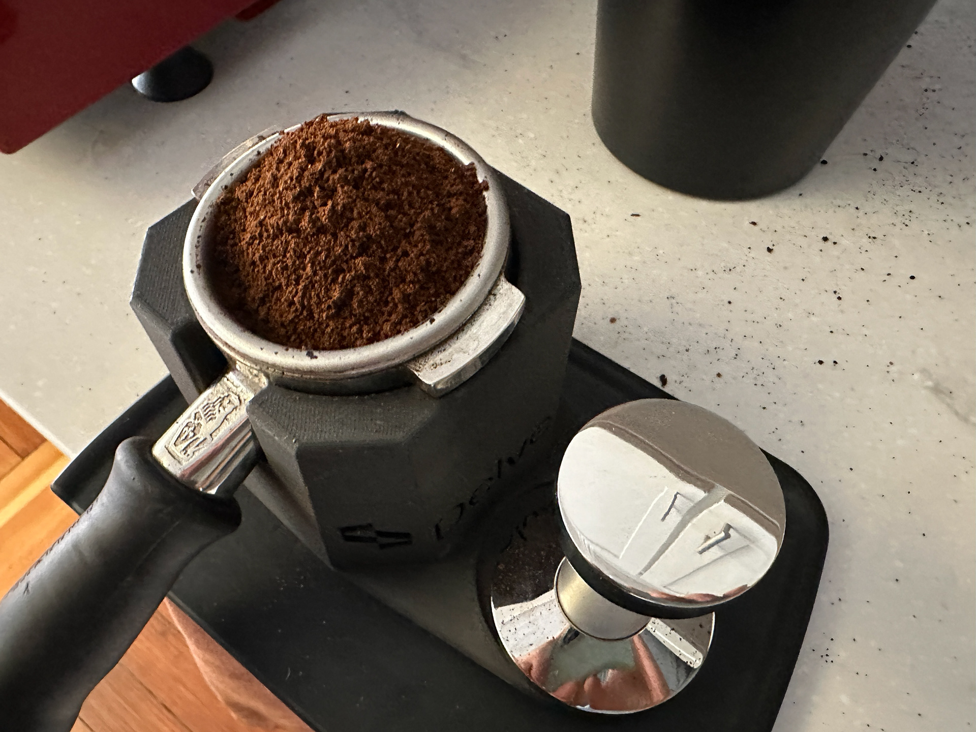 Portafilter at tamping station