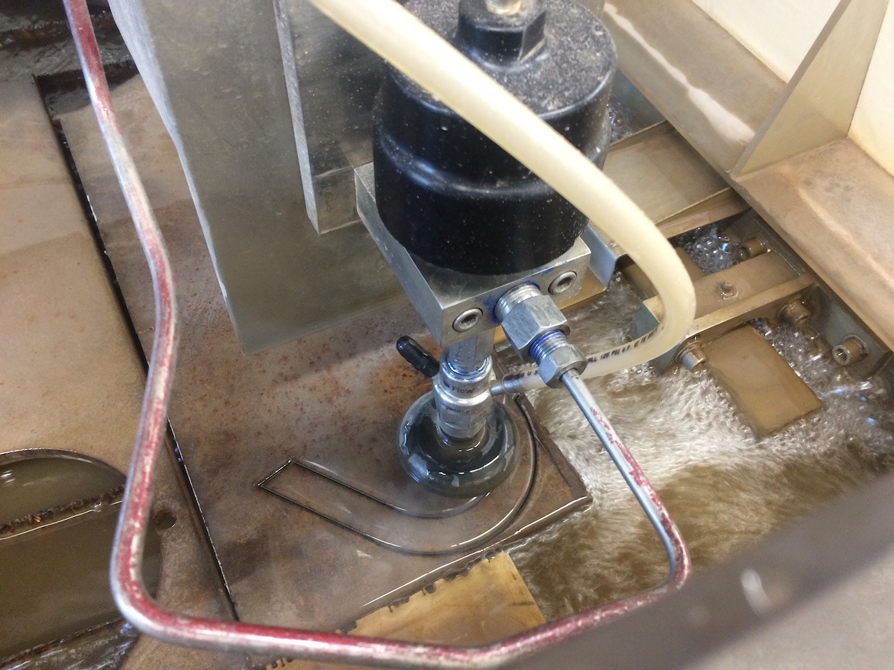 Waterjet-cutting the rear dropouts.