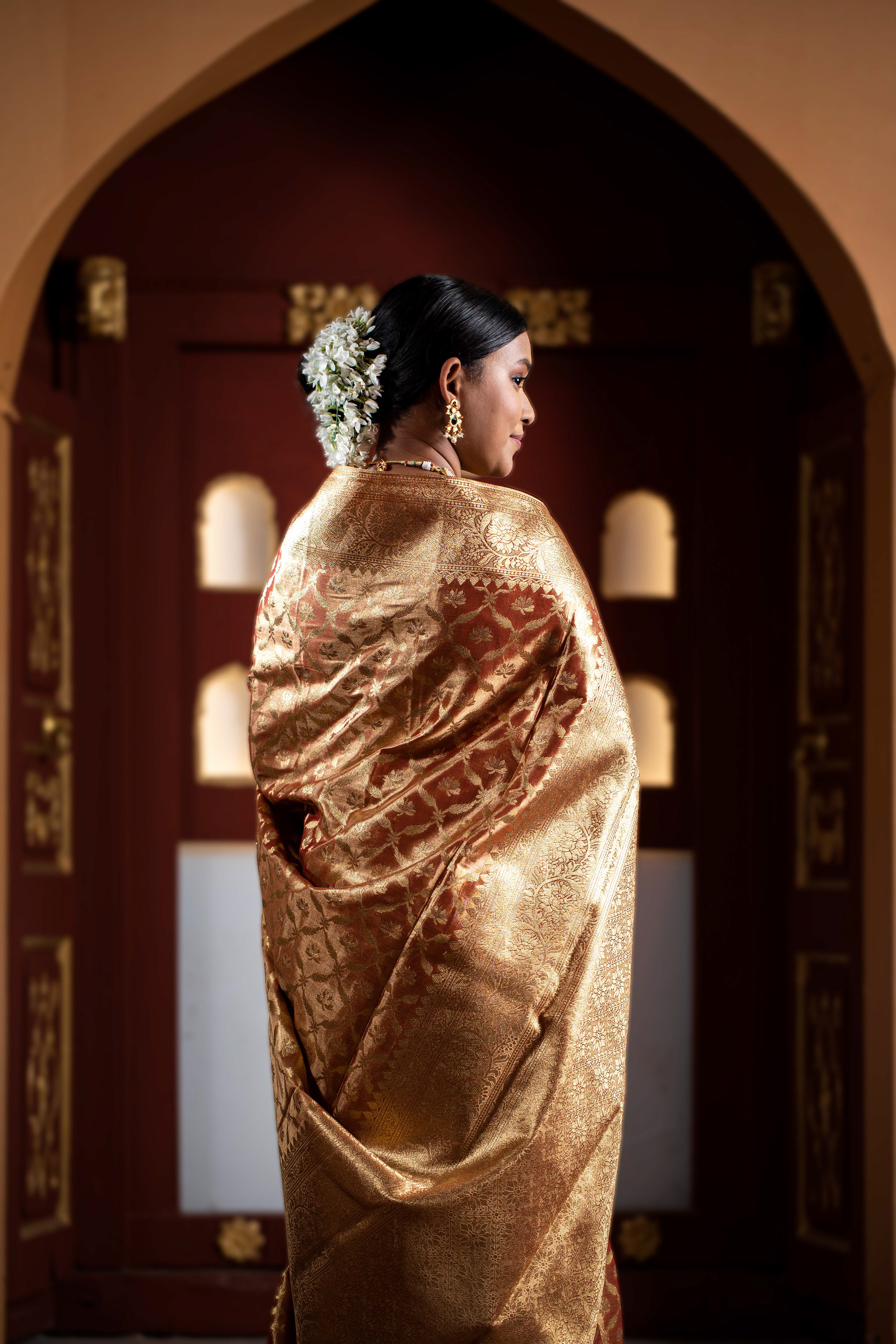  Authentic traditional fashion portrait of a woman in an embroidered silk saree  in warm festival lighting-Fashion-Photography-Pune-Mumbai