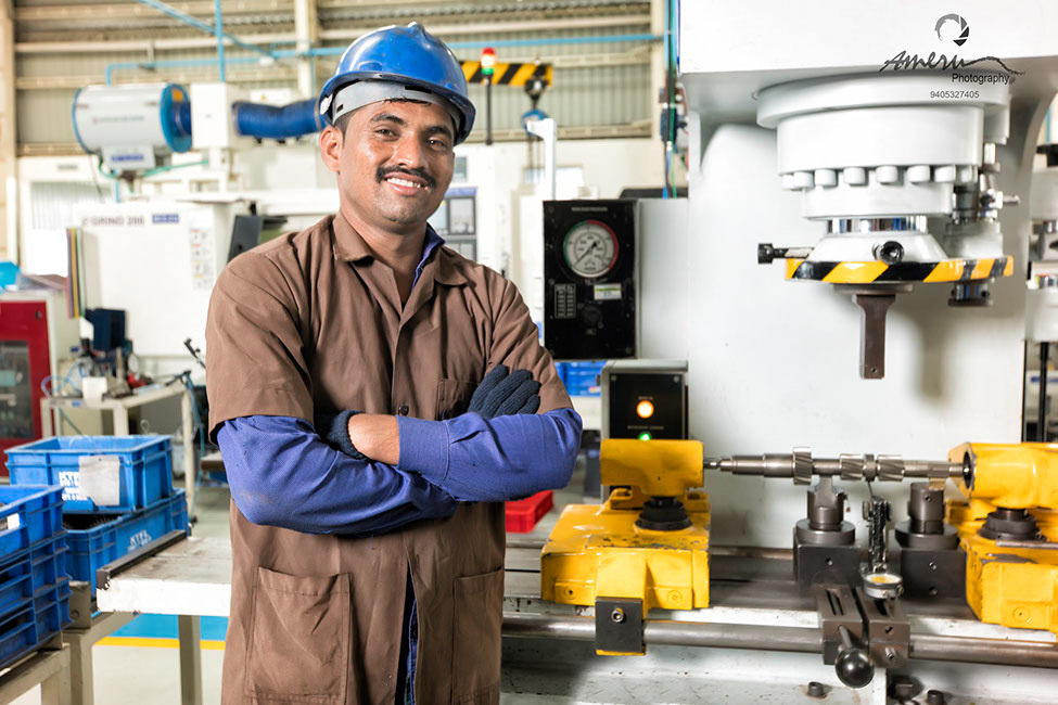 Industrial photography of professionals working in a manufacturing facility in Pune and Mumbai