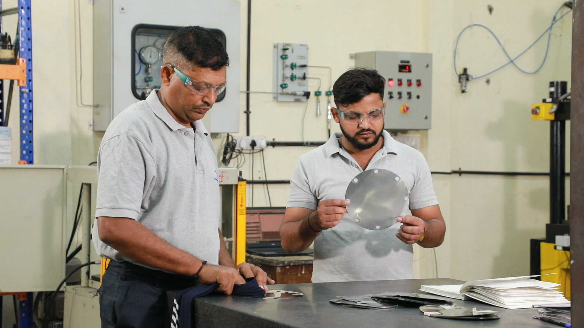 Industrial photography of professionals working in a manufacturing facility in Pune and Mumbai