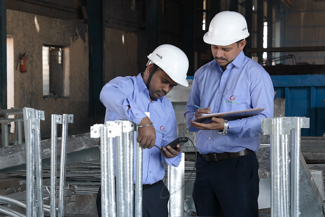 Industrial photography of professionals working in a manufacturing facility in Pune and Mumbai