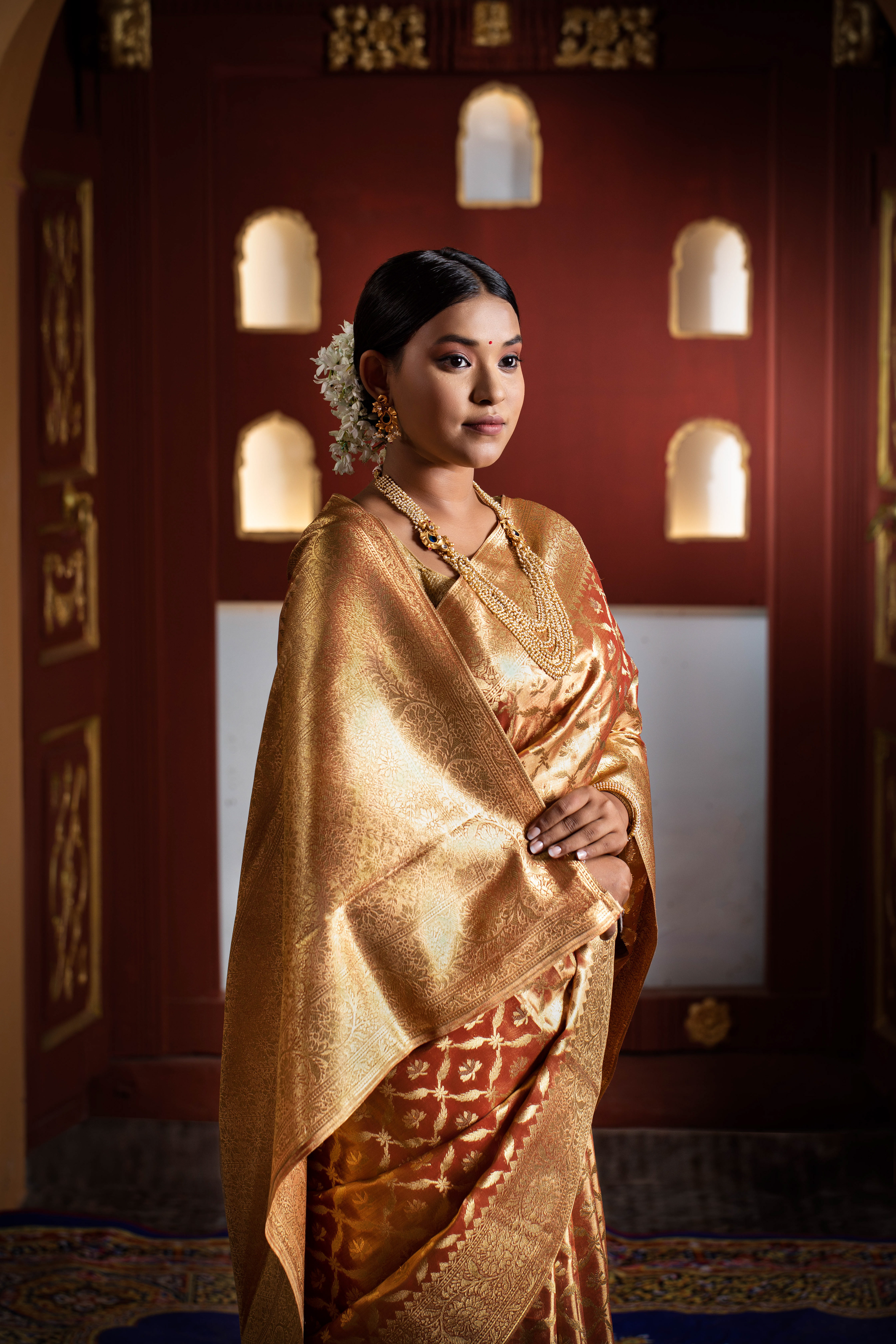  Authentic traditional fashion portrait of a woman in an embroidered silk saree  in warm festival lighting-Fashion-Photography-Pune-Mumbai