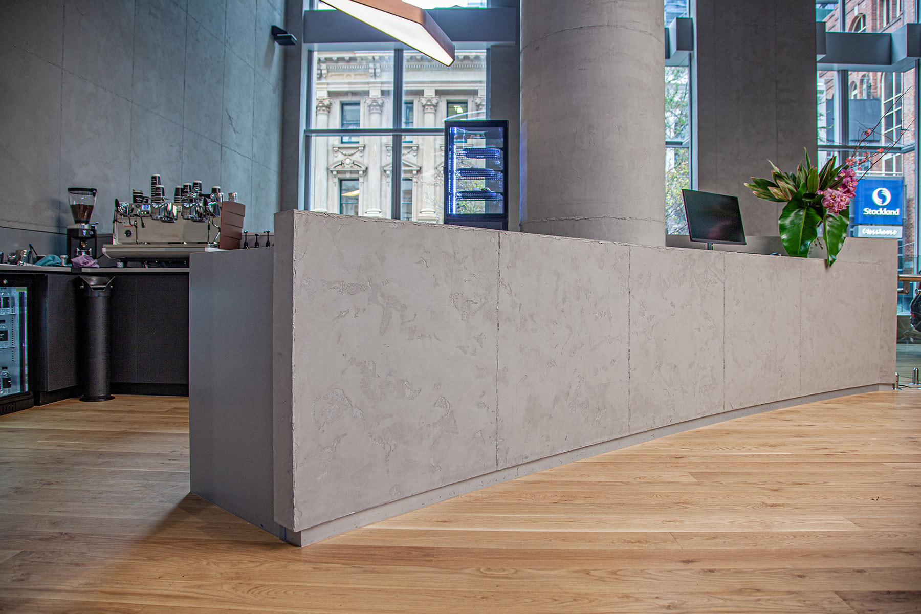 Applied concrete finishes on a bar front - applied by Di Emme Creative Solutions