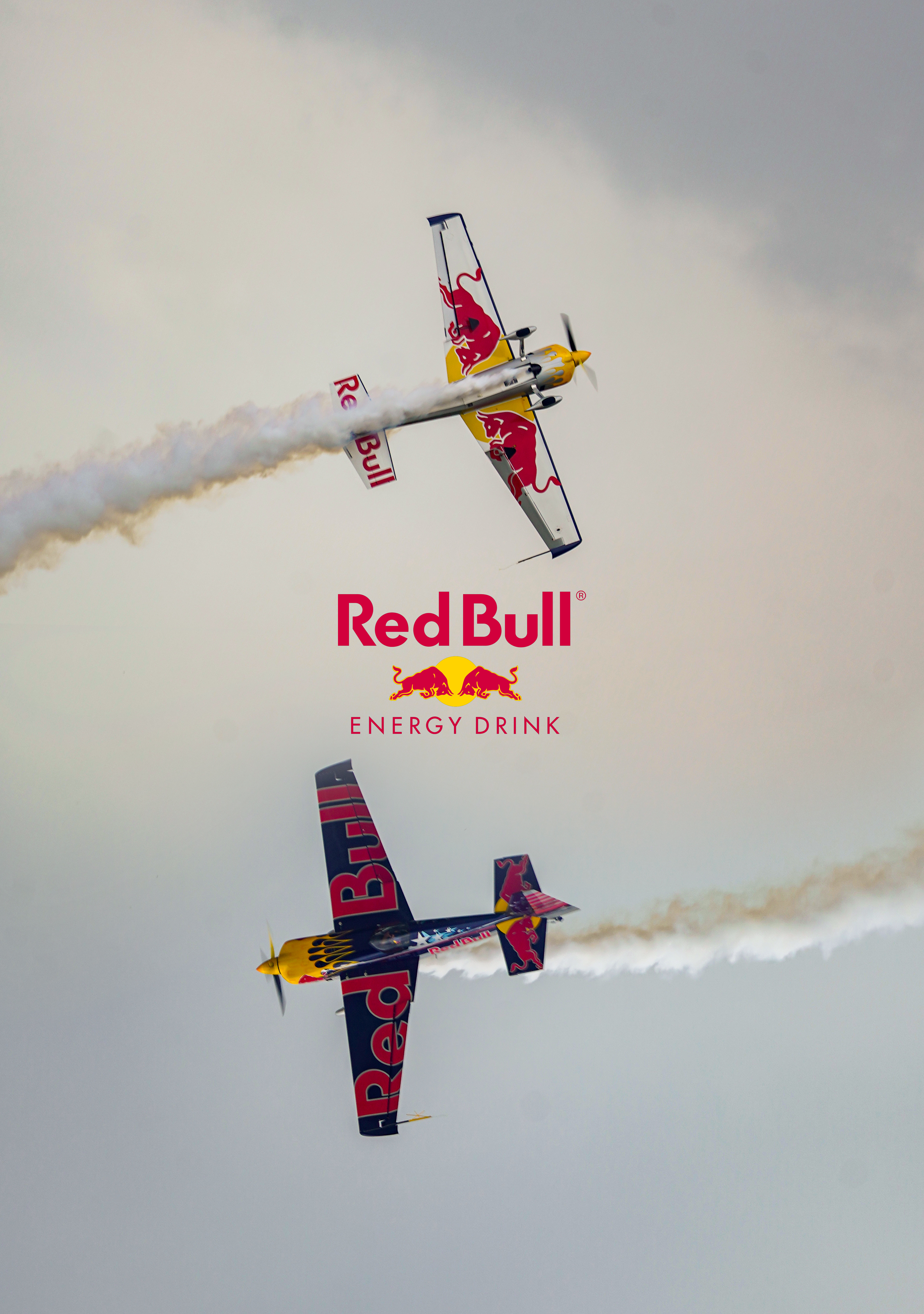 Merging two photos I took at the Oshkosh Airshow, presents Red Bull's literal wings.