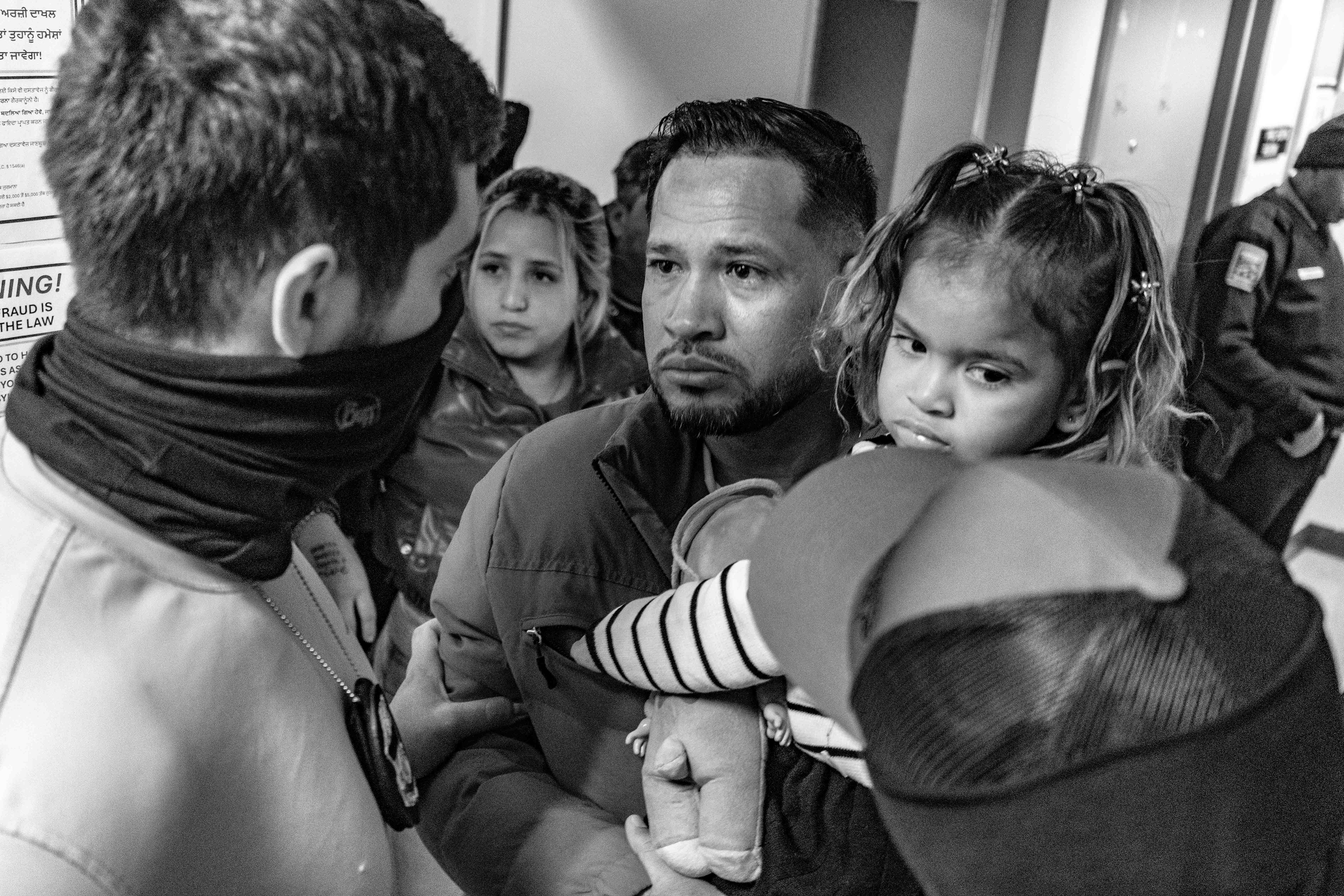 A federal agent stops a respondent holding his child, the agent would let him go.