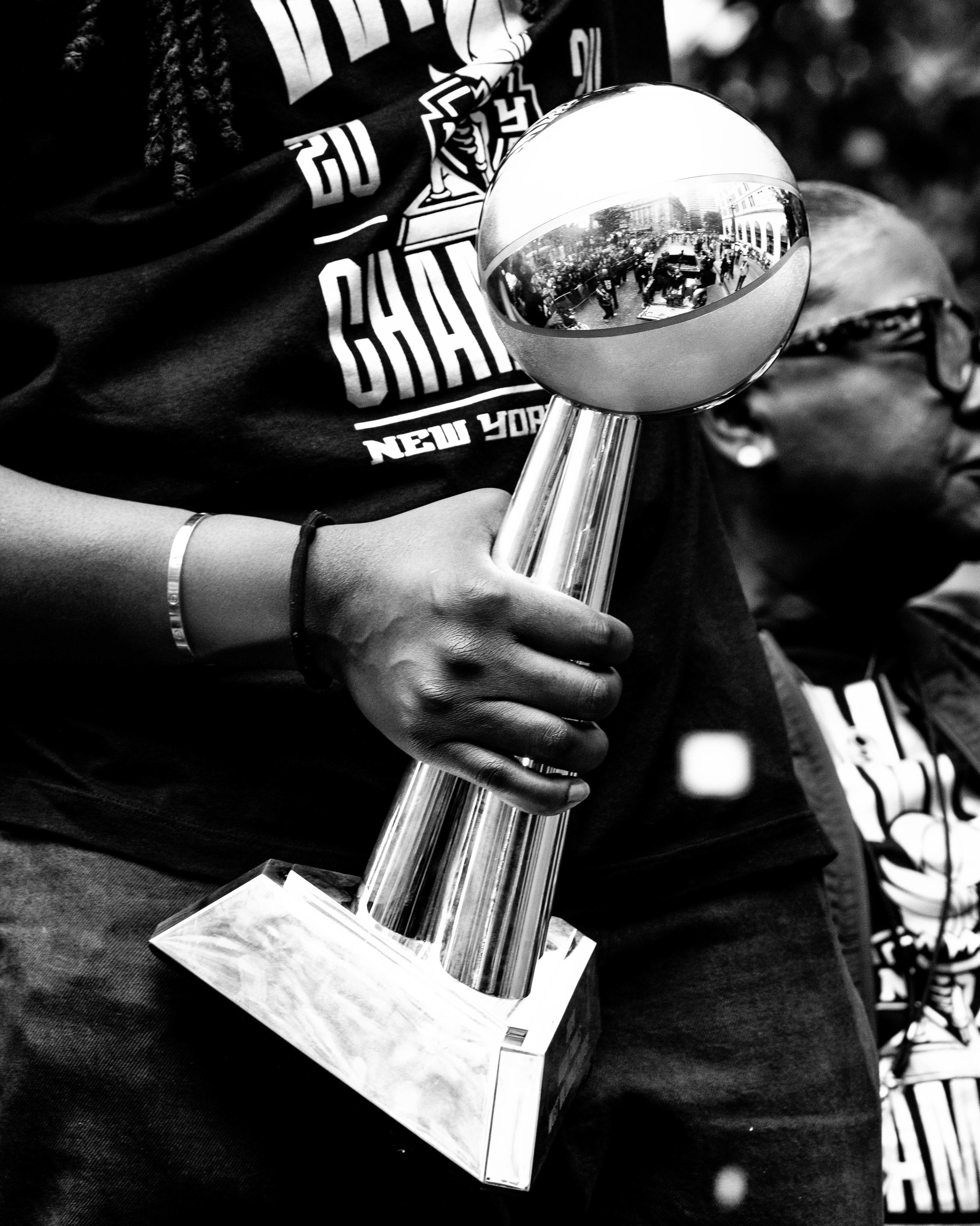 The Finals MVP Trophy is held at the New York Liberty championship parade in New York, New York on October 23rd, 2024.