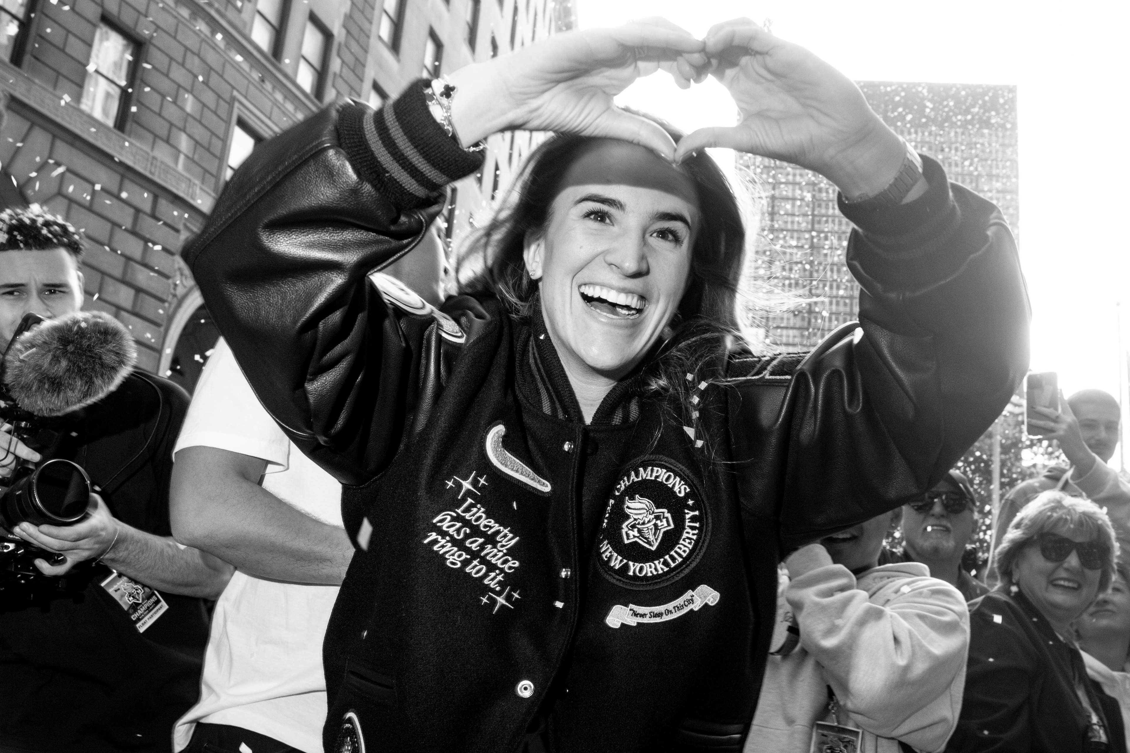 Sabrina Ionescu celebrates at the New York Liberty Championship Parade in New York, New York on October 23rd, 2024.