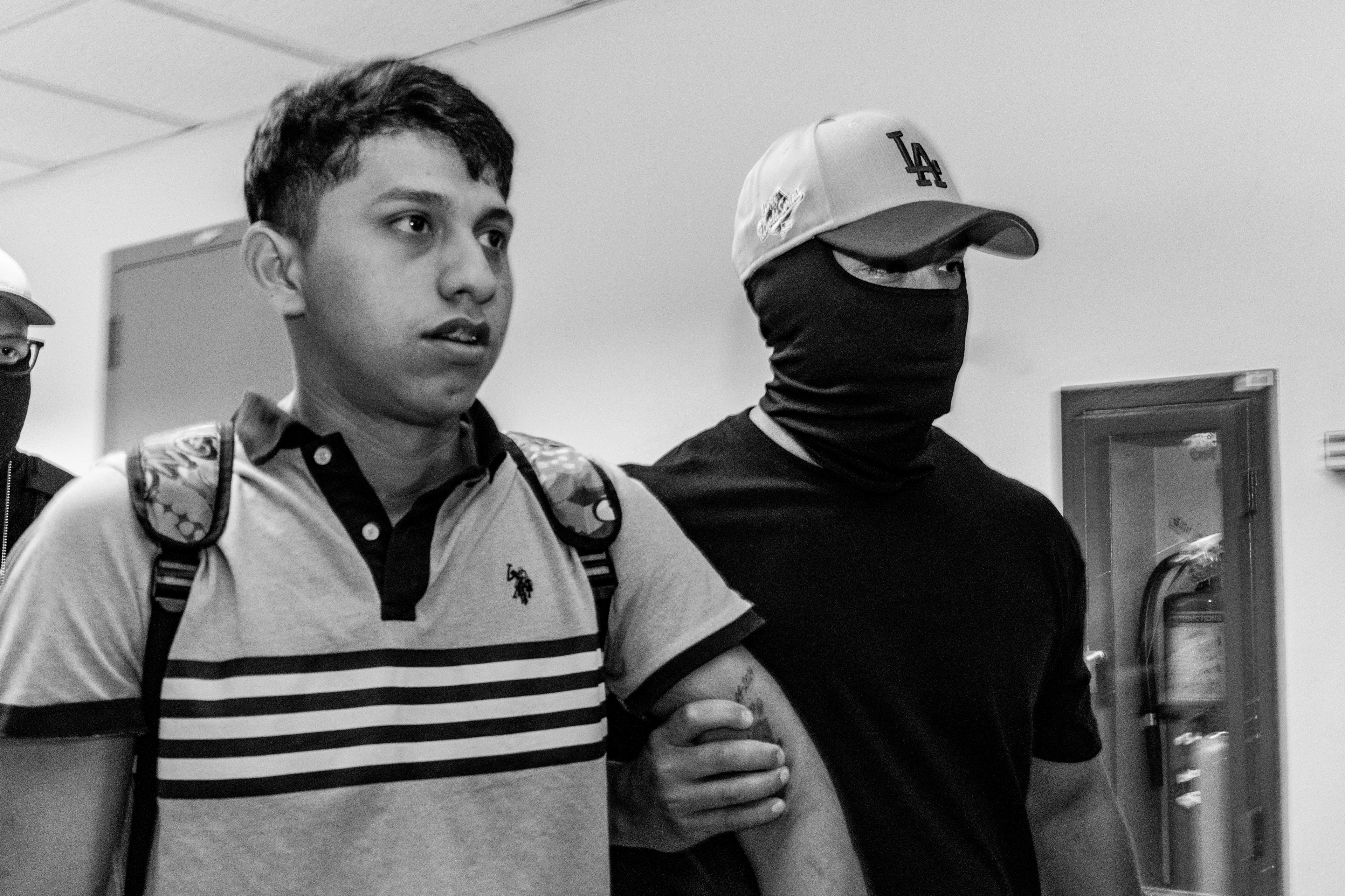 A respondent is detained by federal officers.