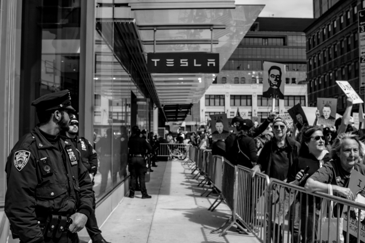 Anti Tesla protestors gather outside of a Tesla dealership in New York, New York on March 29th, 2025. Nationwide protests at Tesla's dealership have become commonplace with Tesla owner Elon Musk's involvement in the Trump administration.