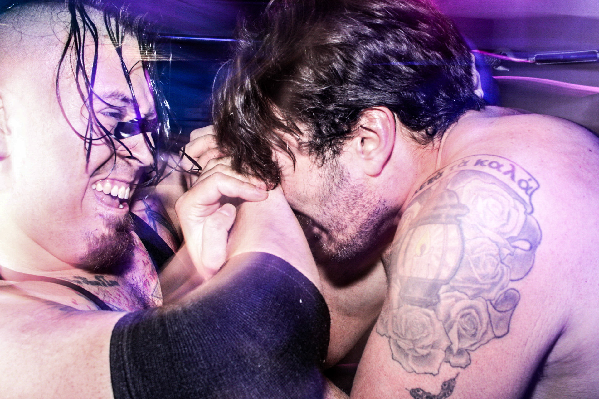 Wrestlers interlock as one suffers an eye poke at an independent show in Brooklyn, New York on March 9th, 2024.