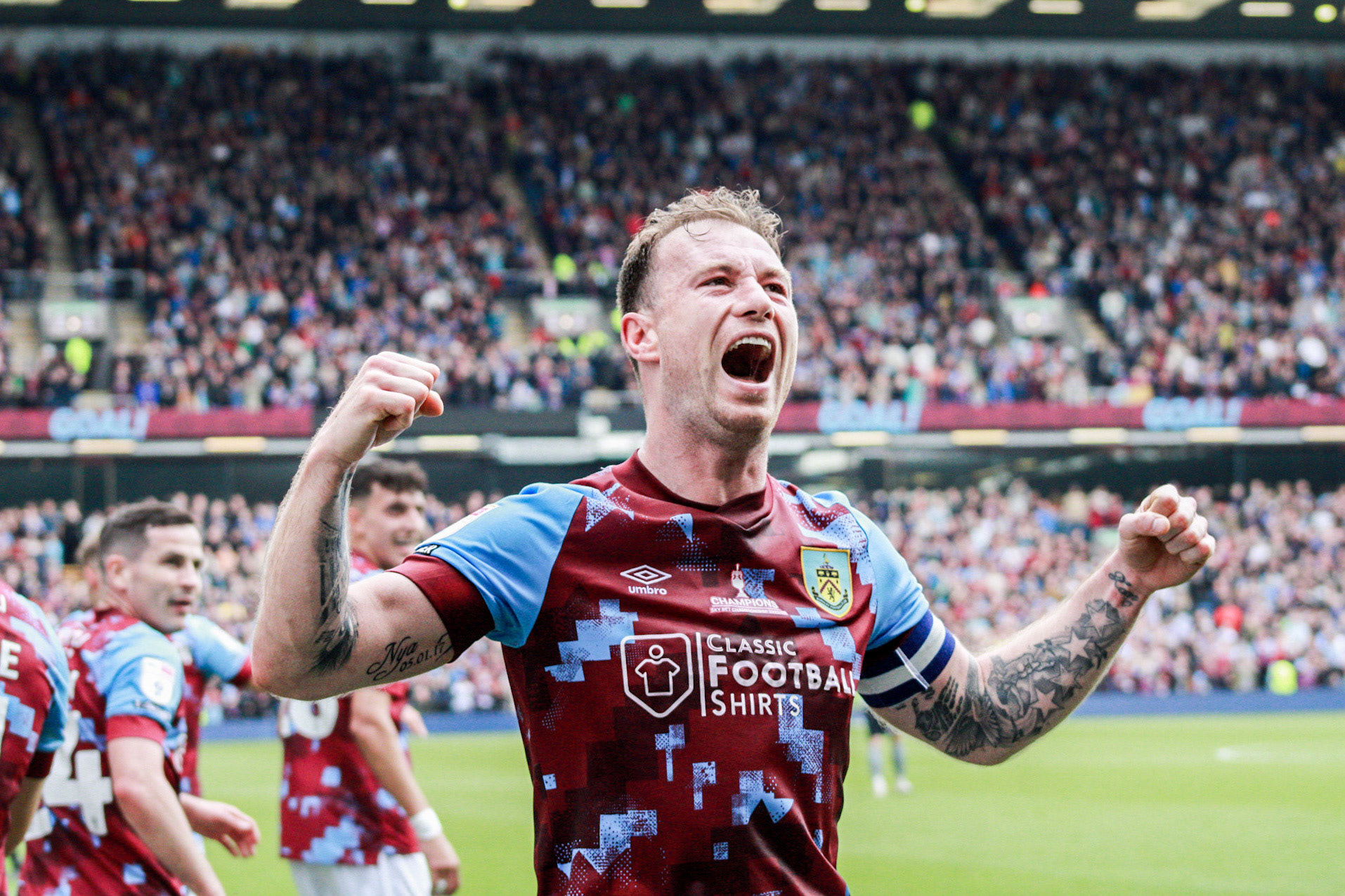 Ashley Barnes celebrates a goal against Cardiff FC on the last day of the EFL Championship season in Turf Moore, Burnley on May 8th, 2023.