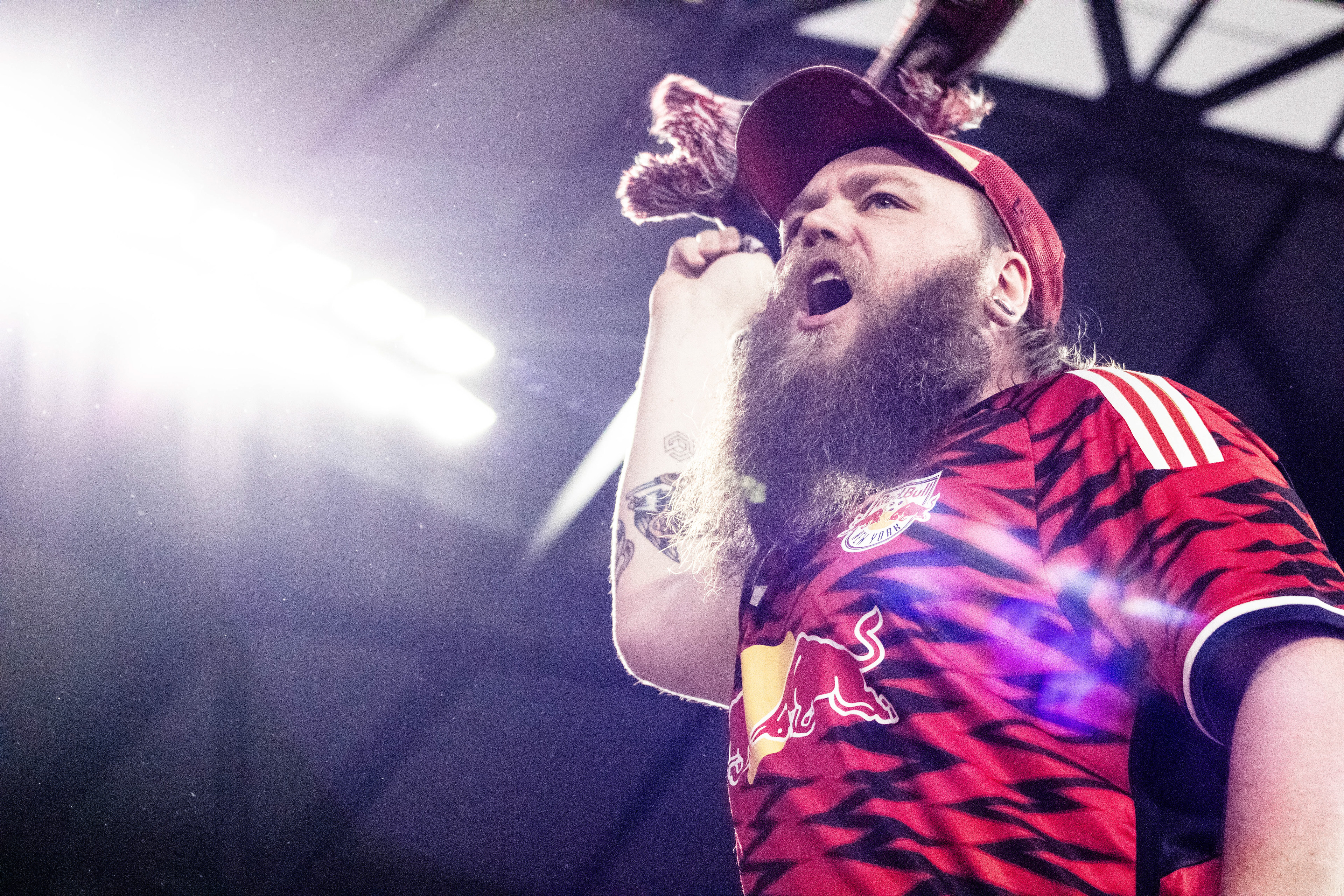 A New York Red Bull's fan leads a chant as the Red Bulls take on Columbus Crew in Harrison, New Jersey on October 19th, 2024.