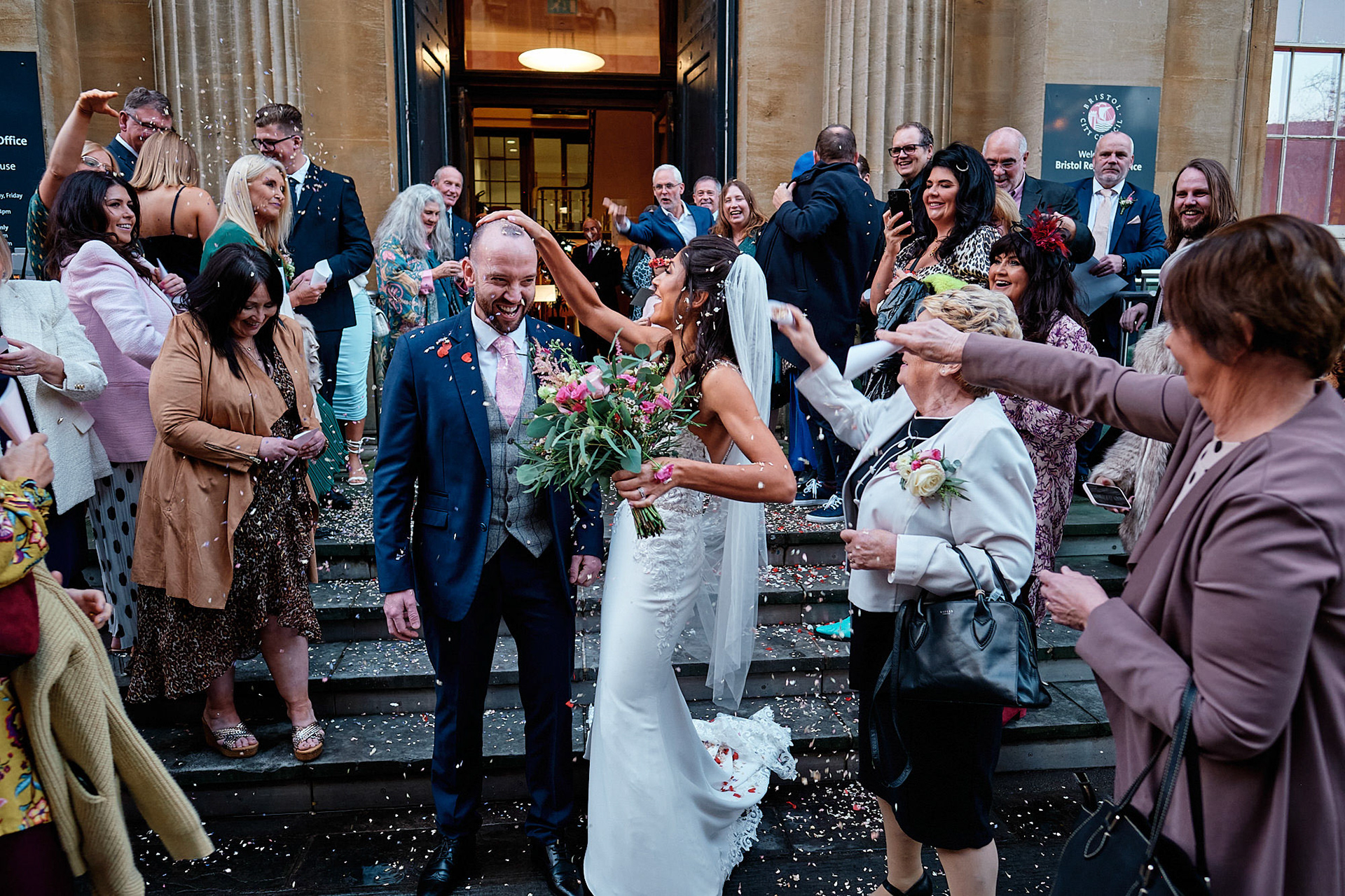 A married couple outside Bristol Register Office