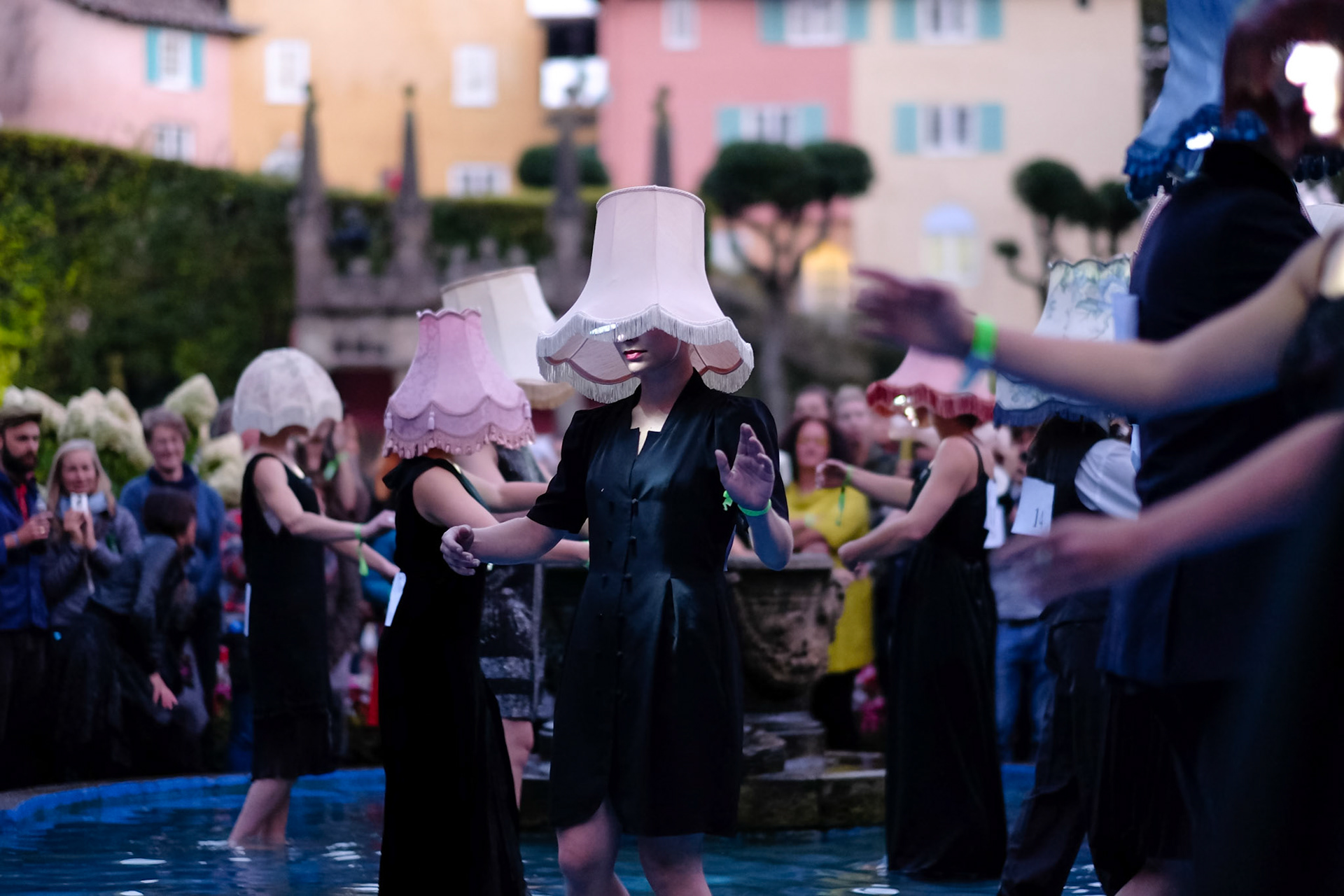 Atmosphere during Festival No. 6 on 06/09/2014 at Festival No. 6, Portmeirion.  The lampshade Ladies. A ballroom performance as attendees are asked to join a 'shady' performer. The dancers started off in the pool before walking through the village. Picture by Julie Edwards