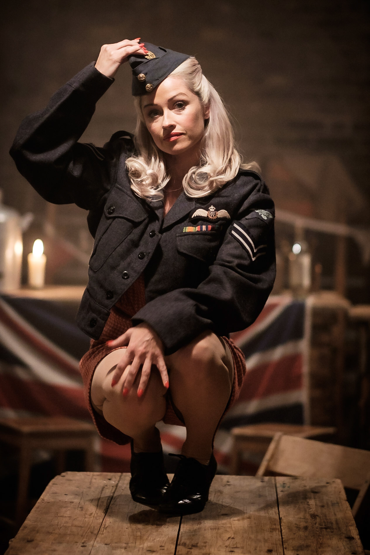 Cast on the set of Once Up On A Time In London shot on 12/04/2017 at MC Motors, London. Pictured: Tiger Lilly dances on the tables played by Shereen Ball . Picture by Julie Edwards