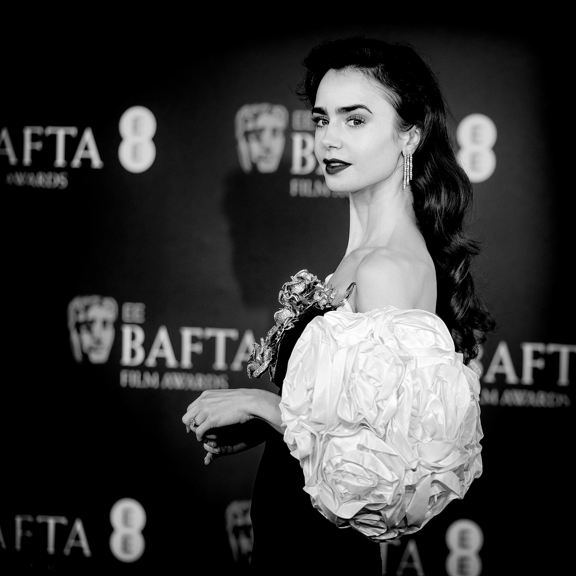 Lily Collins arriving at the 2024 EE BAFTA Film Awards on Sunday 18 February 2024 at Royal Festival Hall, London. . Picture by Julie Edwards/LFI/Avalon. All usages must be credited Julie Edwards/LFI/Avalon..
