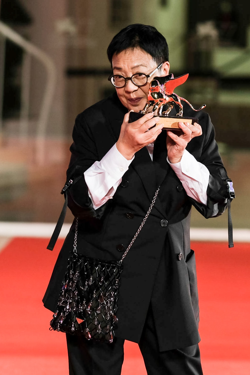 Ann Hui poses on the red carpet with her Golden Lion For Lifetime Achievement during the 77th Venice International Film Festival ( La Biennale Di Venezia ) on Tuesday 8 September 2020 at Palazzo del Cinema , Lido, Venice. . Picture by Julie Edwards/LFI/Avalon. All usages must be credited Julie Edwards/LFI/Avalon.