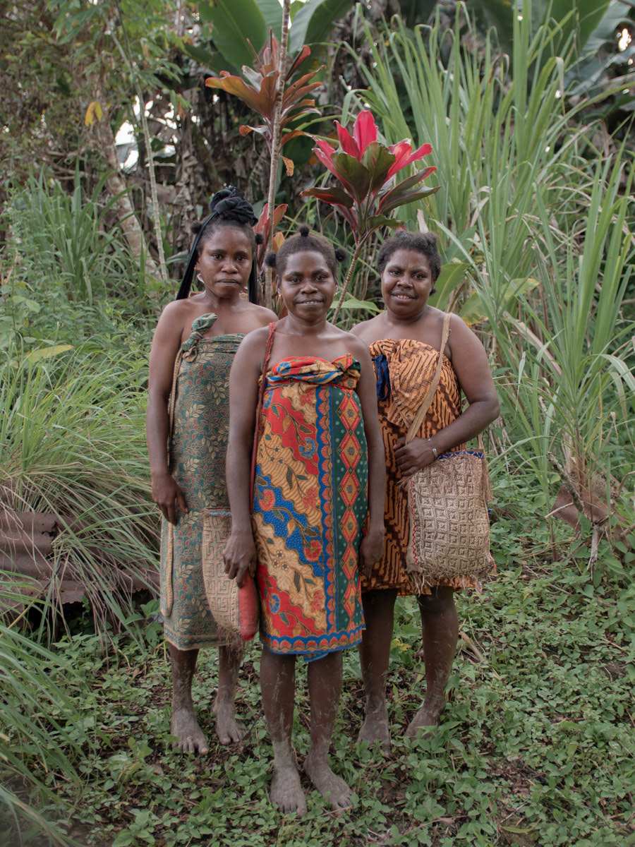A number of women from South Sorong were photographed after farming in their customary forest.
