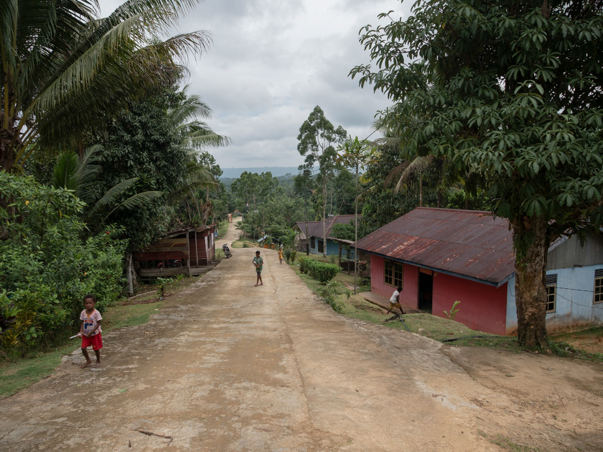 The atmosphere in Sira-Manggroholo village is quiet, while residents farm in the village forest.