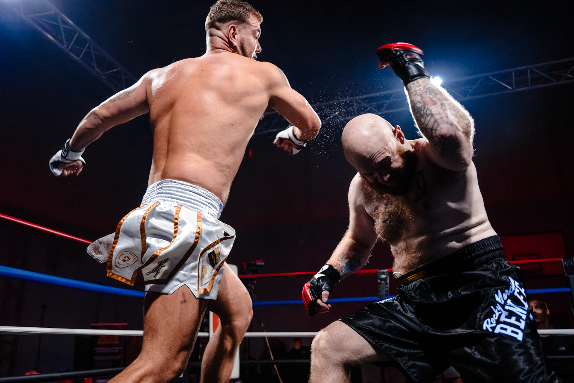 Hybrid boxers exchange blows in the ring at Torquay event.