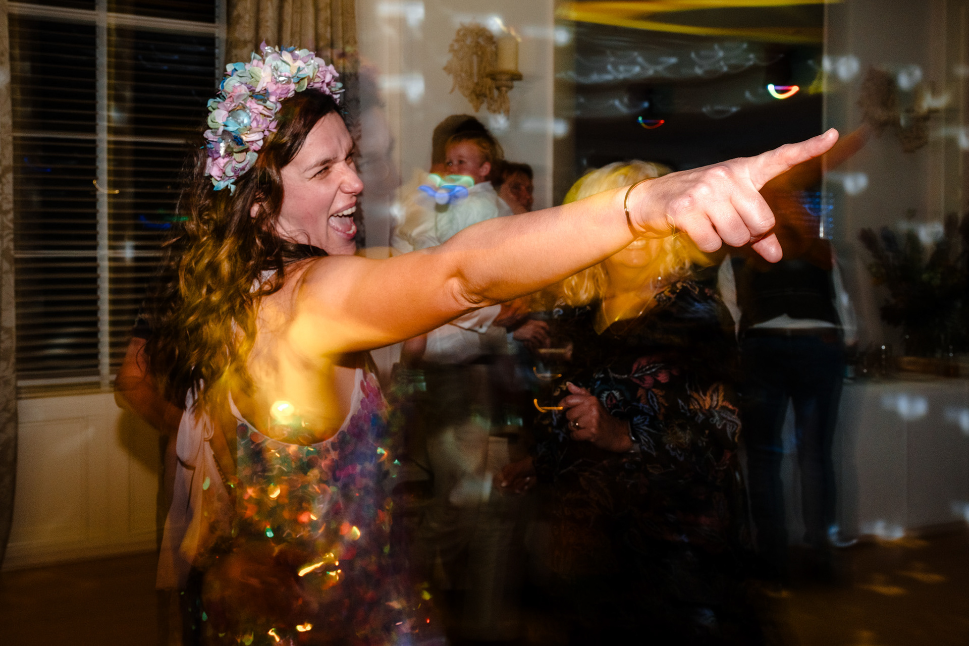The bride dances at her Devon wedding.