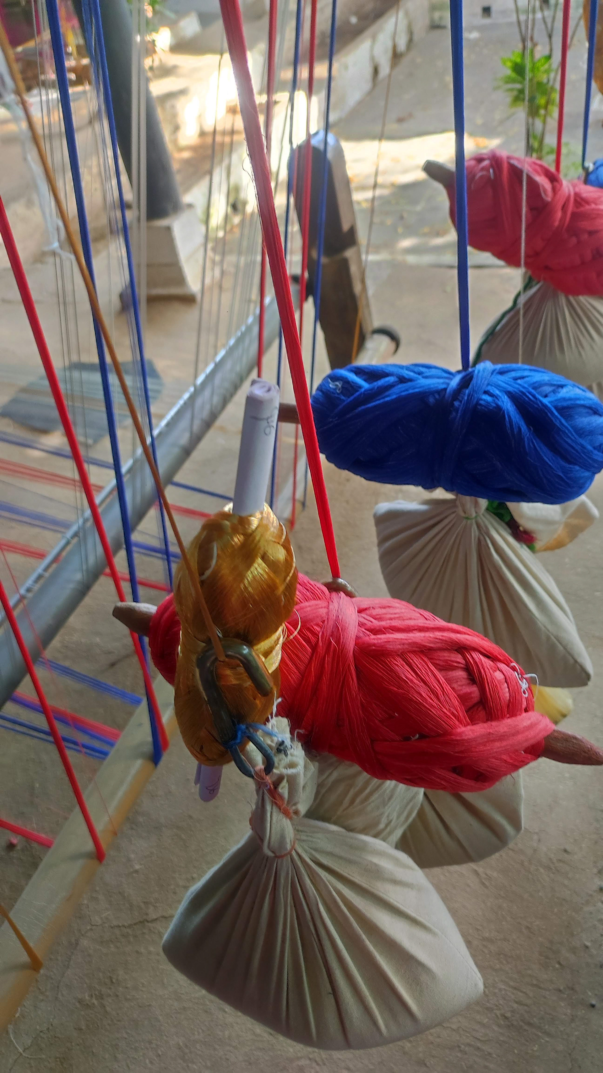 Vibrant threads waiting to be woven into a story at Rehwa Society, Maheshwar