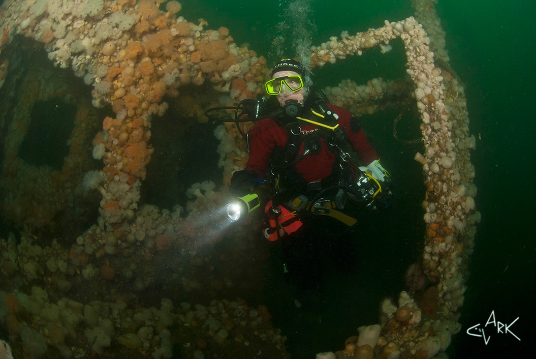 DIVER EXPLORES SHIPWRECK