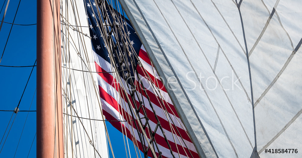 Stars & Stripes flies between mizzen and staysails