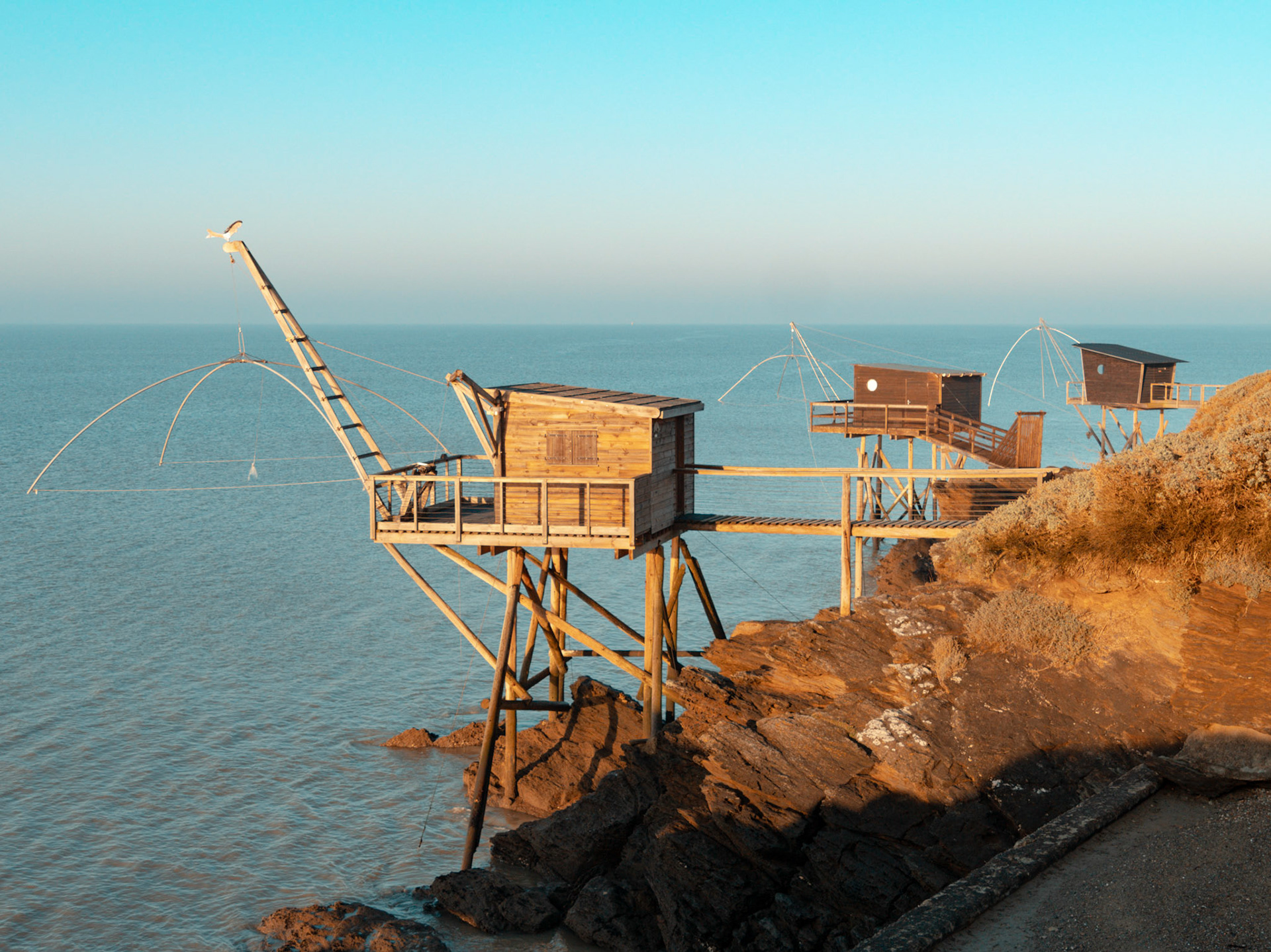 Carrelets au soleil levant