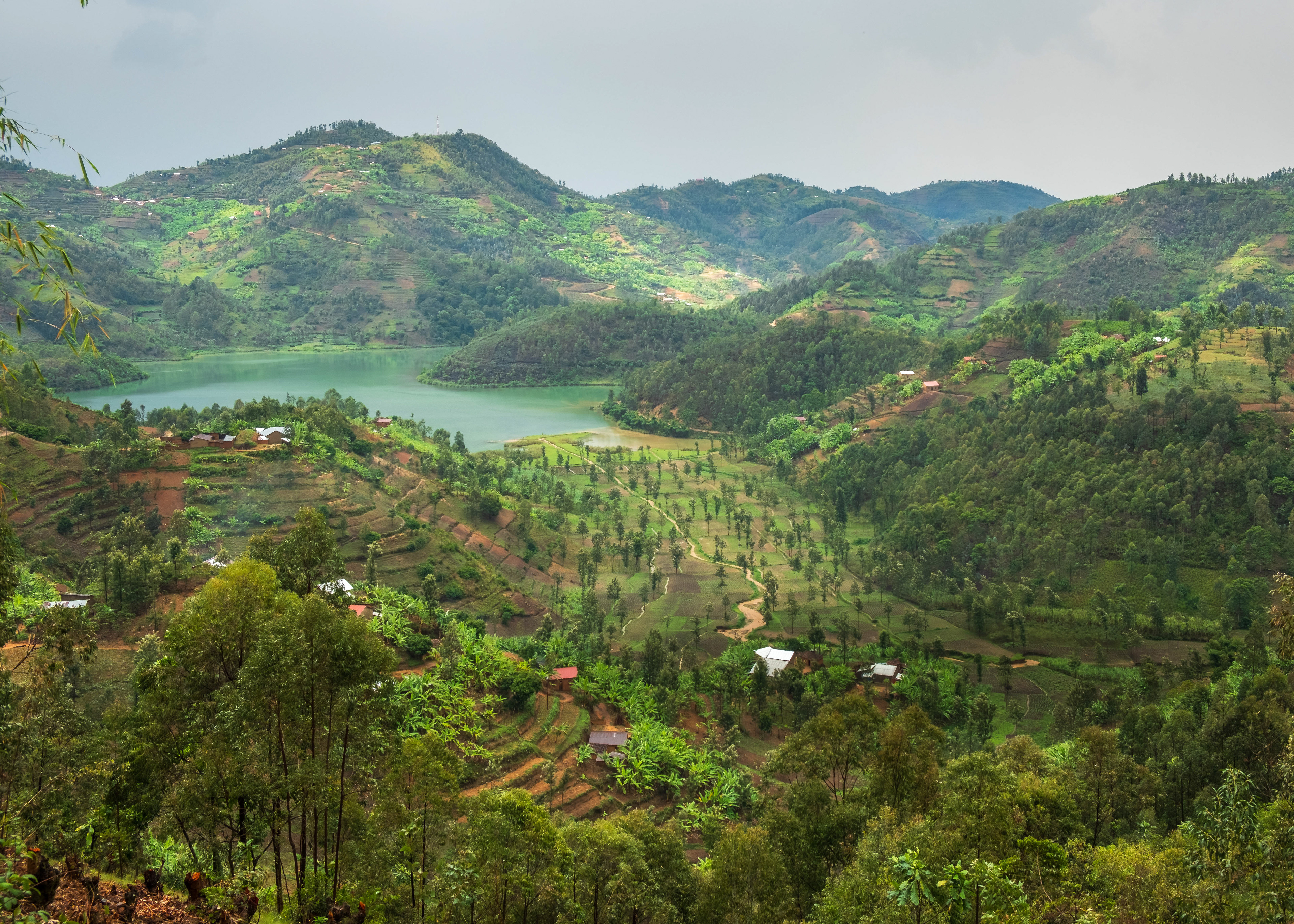 Valley and lake with houses on the hills