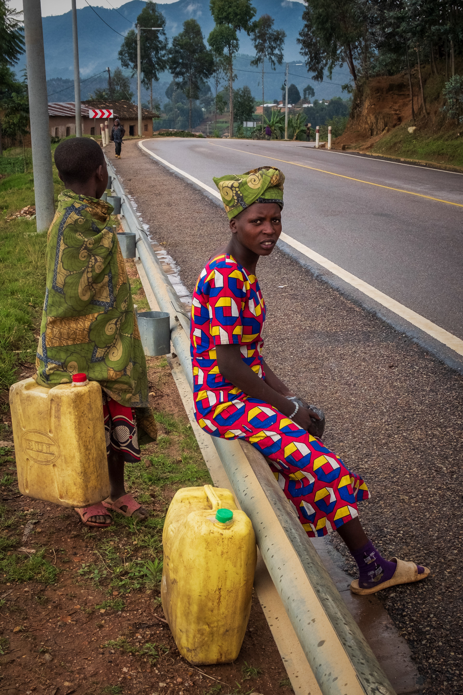 Rwandan woman with fuel
