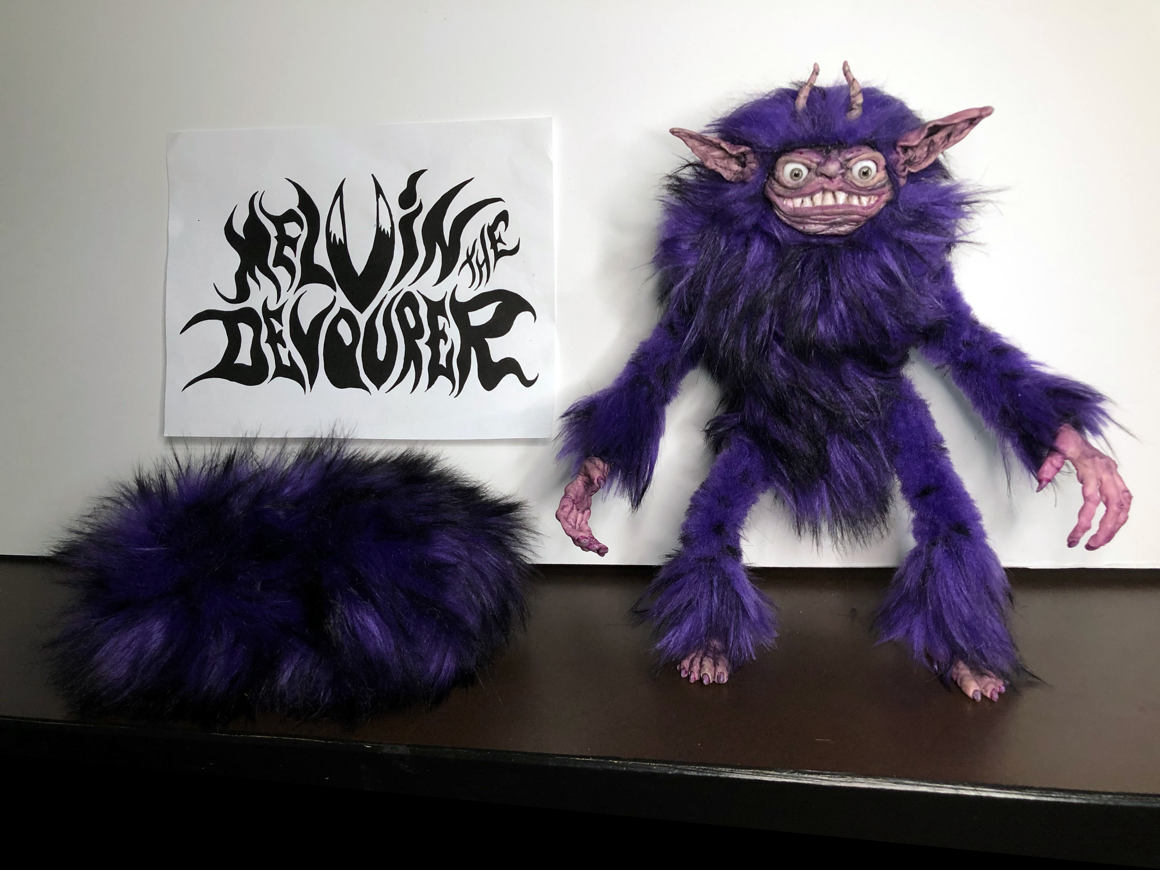 Melvin: posable screen used monster. 18"bendable.  Workable fingers. With ball form for locomotion.